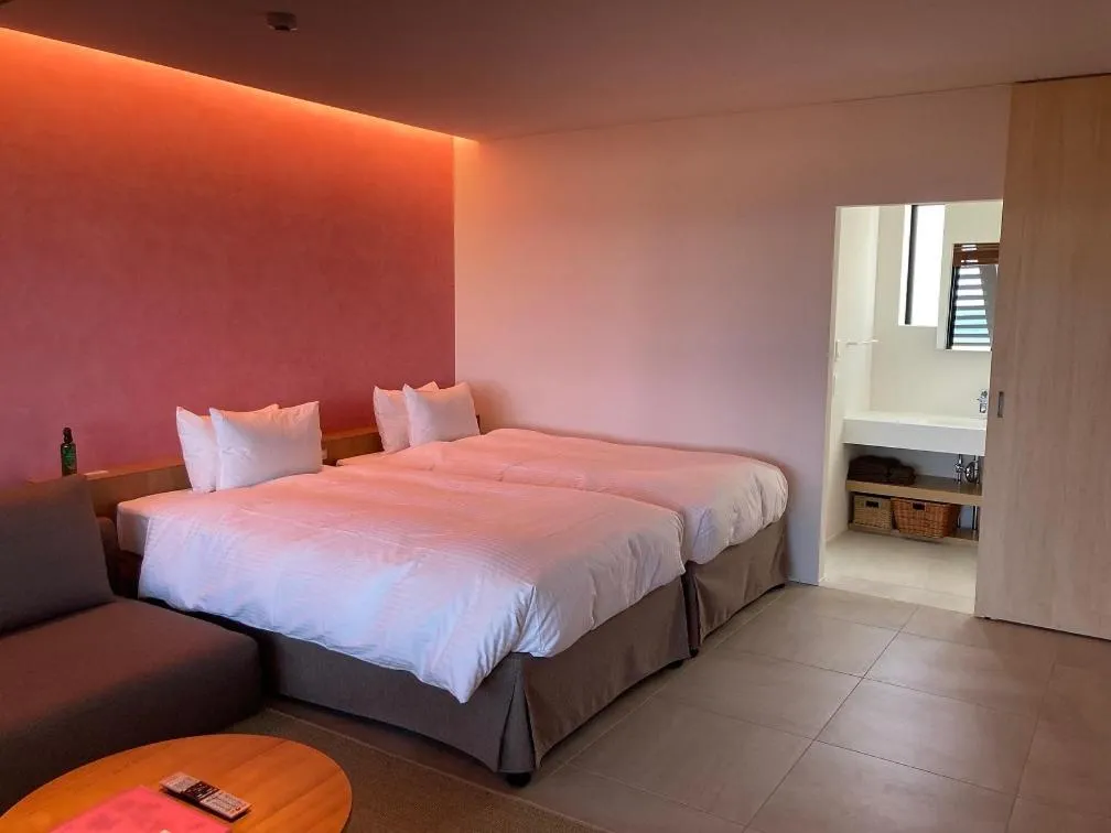 Bed in そらすな Beach Side Resort Hotel