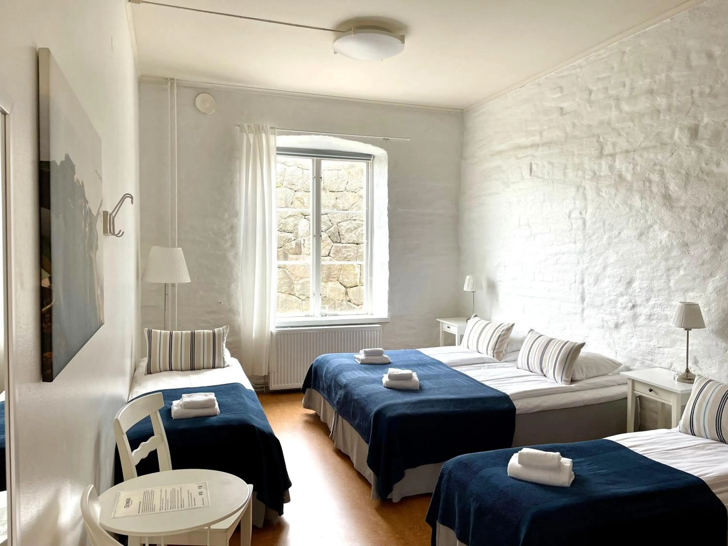 Photo of the whole room, Bed in Fästningens