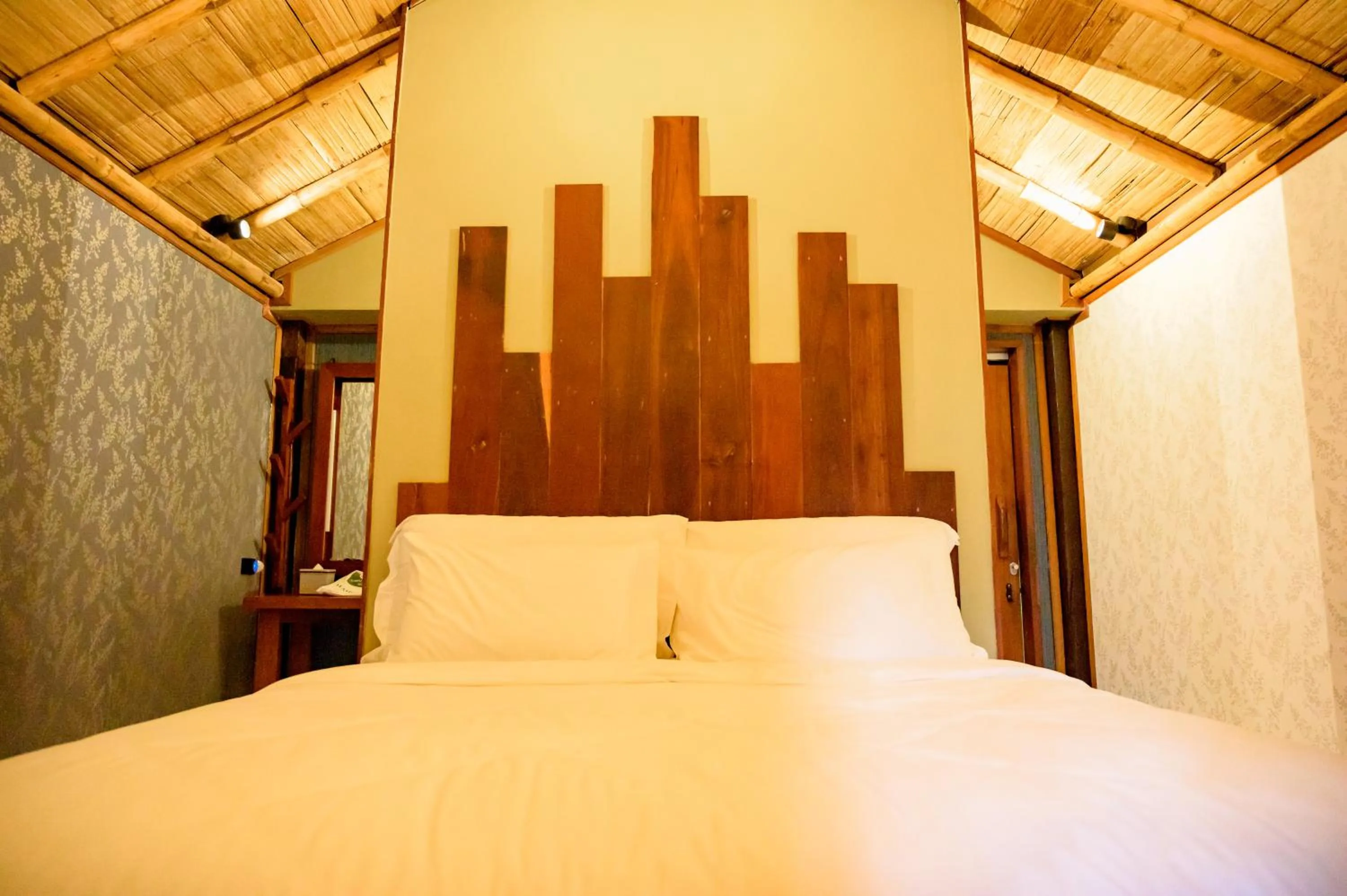 Bed in Earth Elements Eco Resort