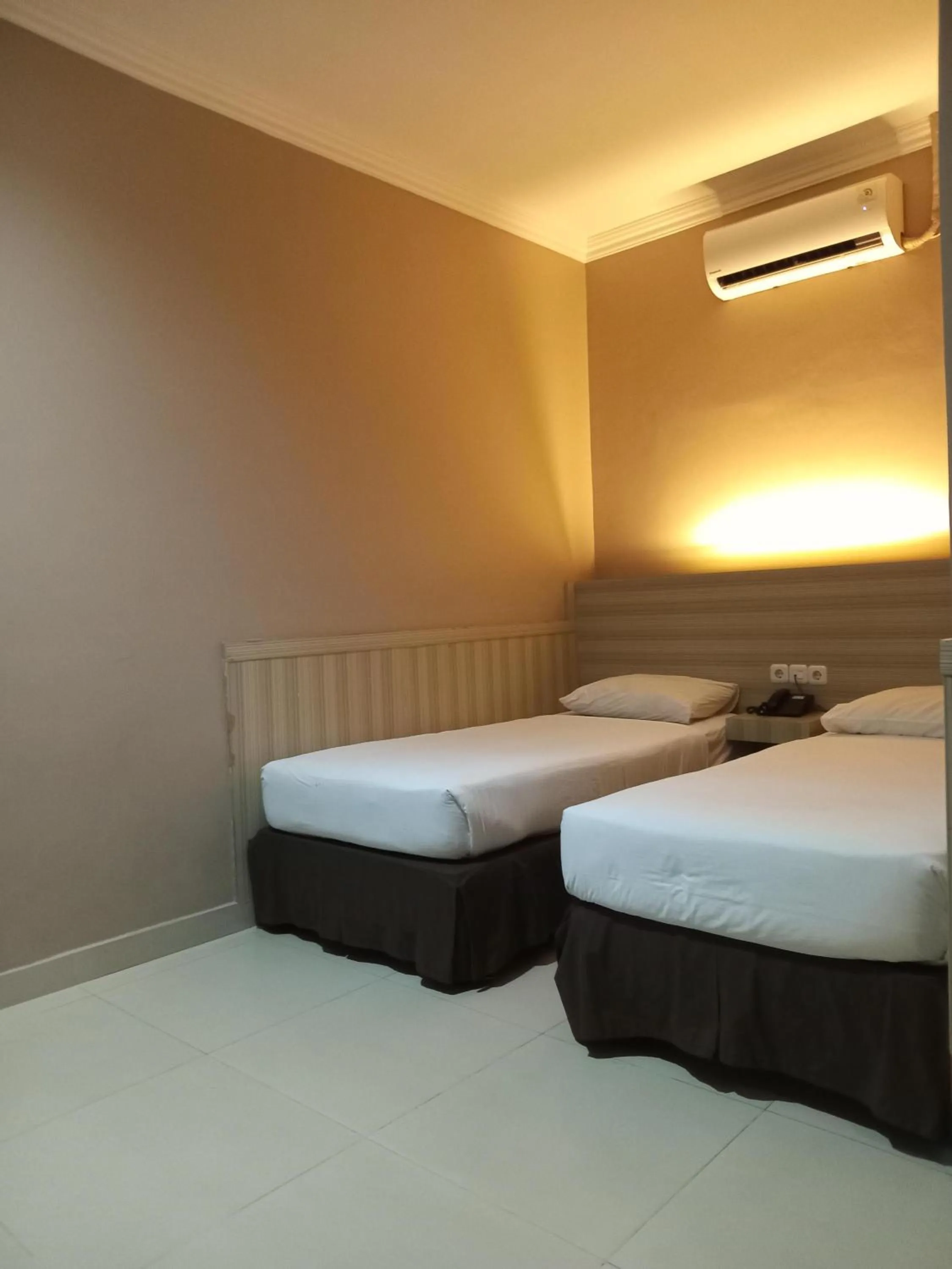 Bed in Violand Garden Hotel Samarinda