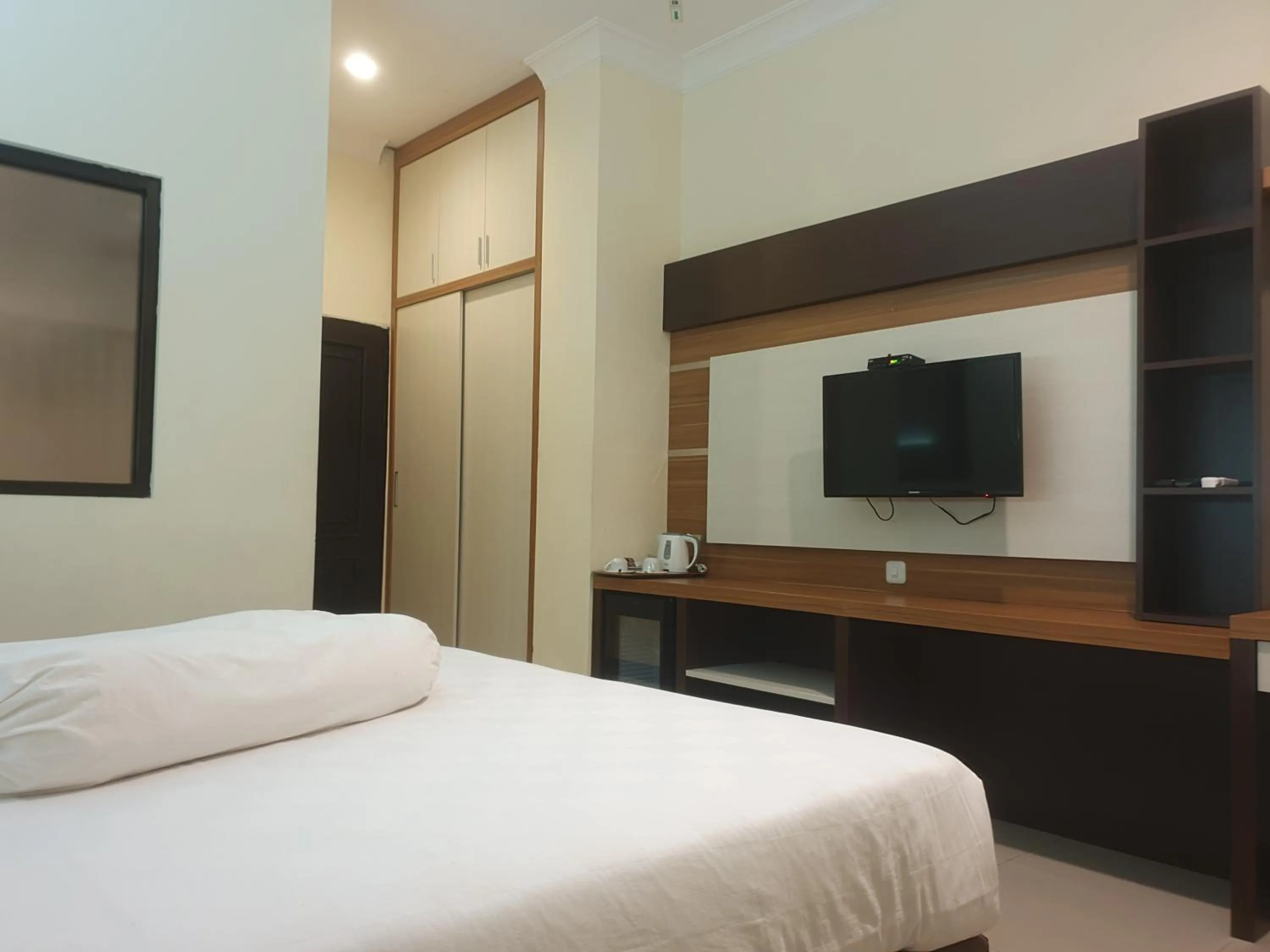 Bed in Violand Garden Hotel Samarinda