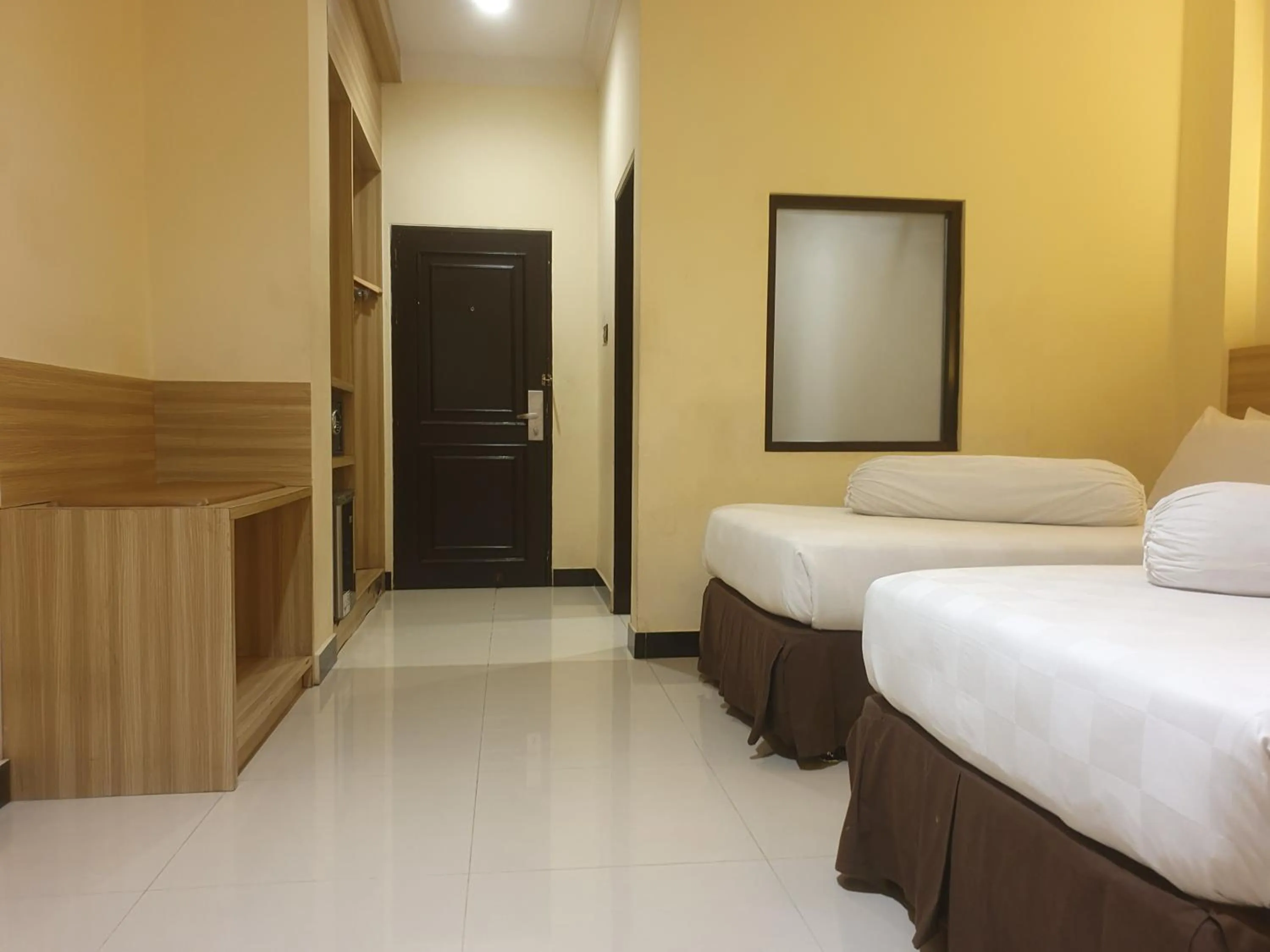 Bed in Violand Garden Hotel Samarinda