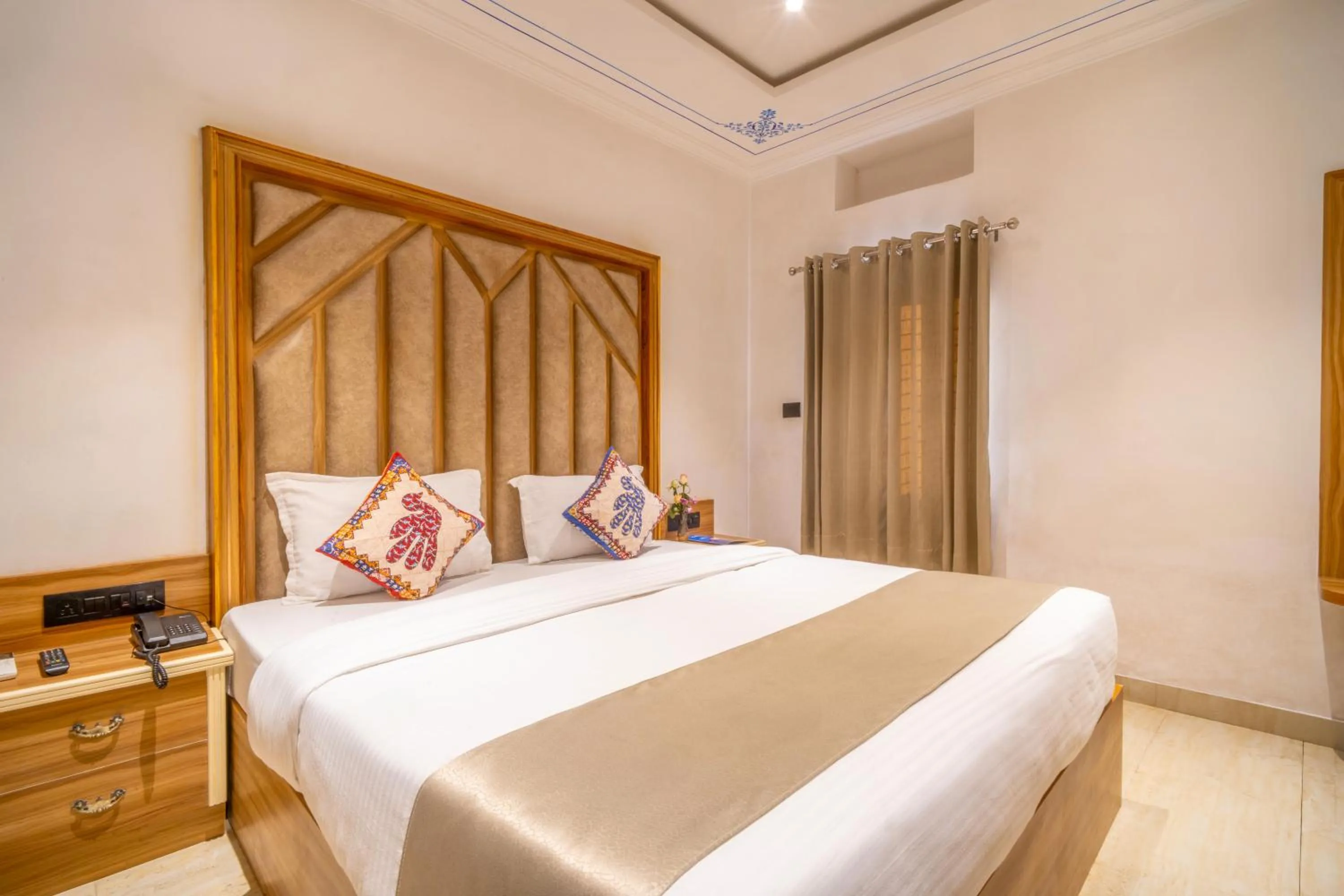 Bed in Amoraya Udaipur