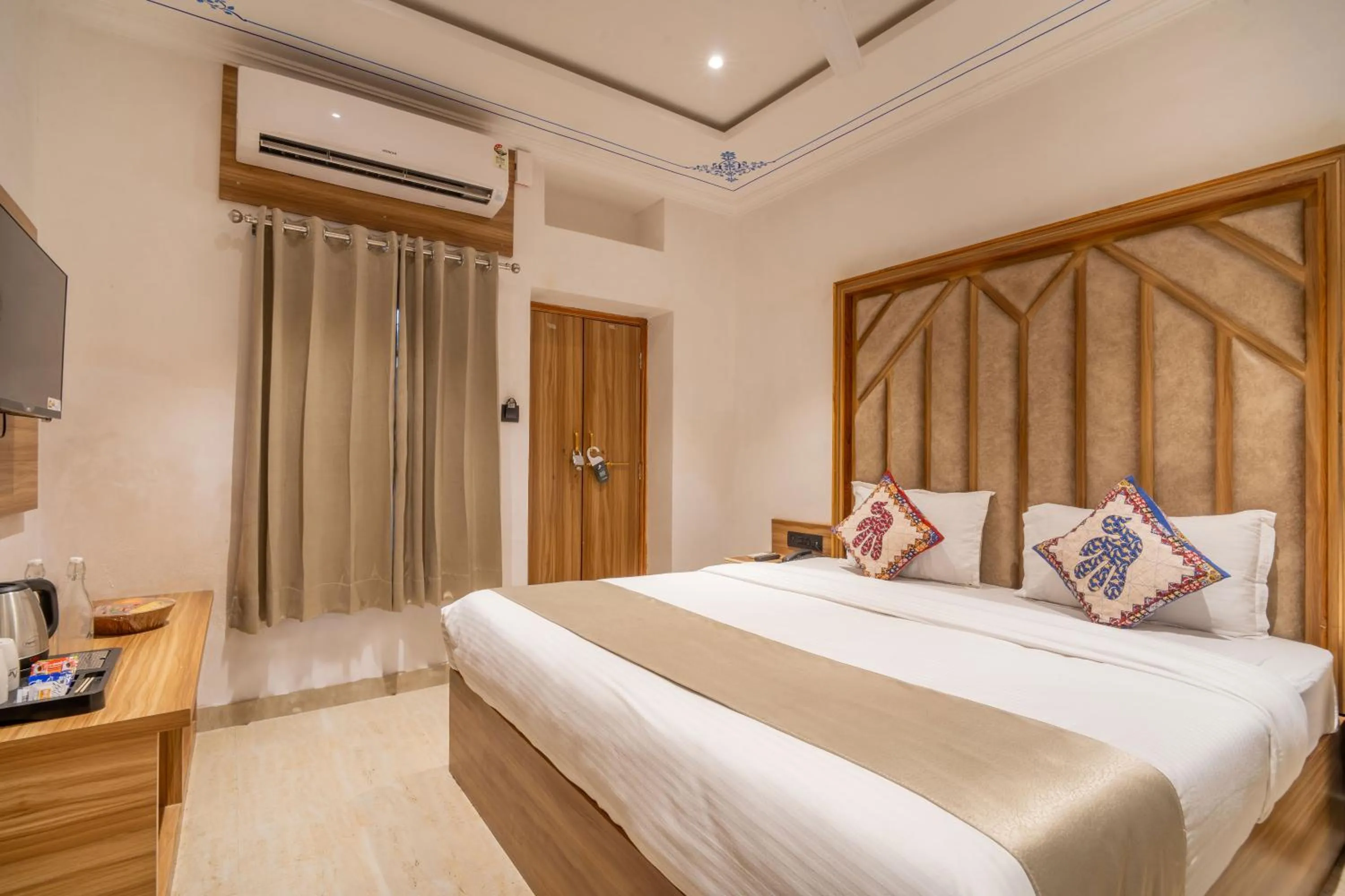 Bed in Amoraya Udaipur