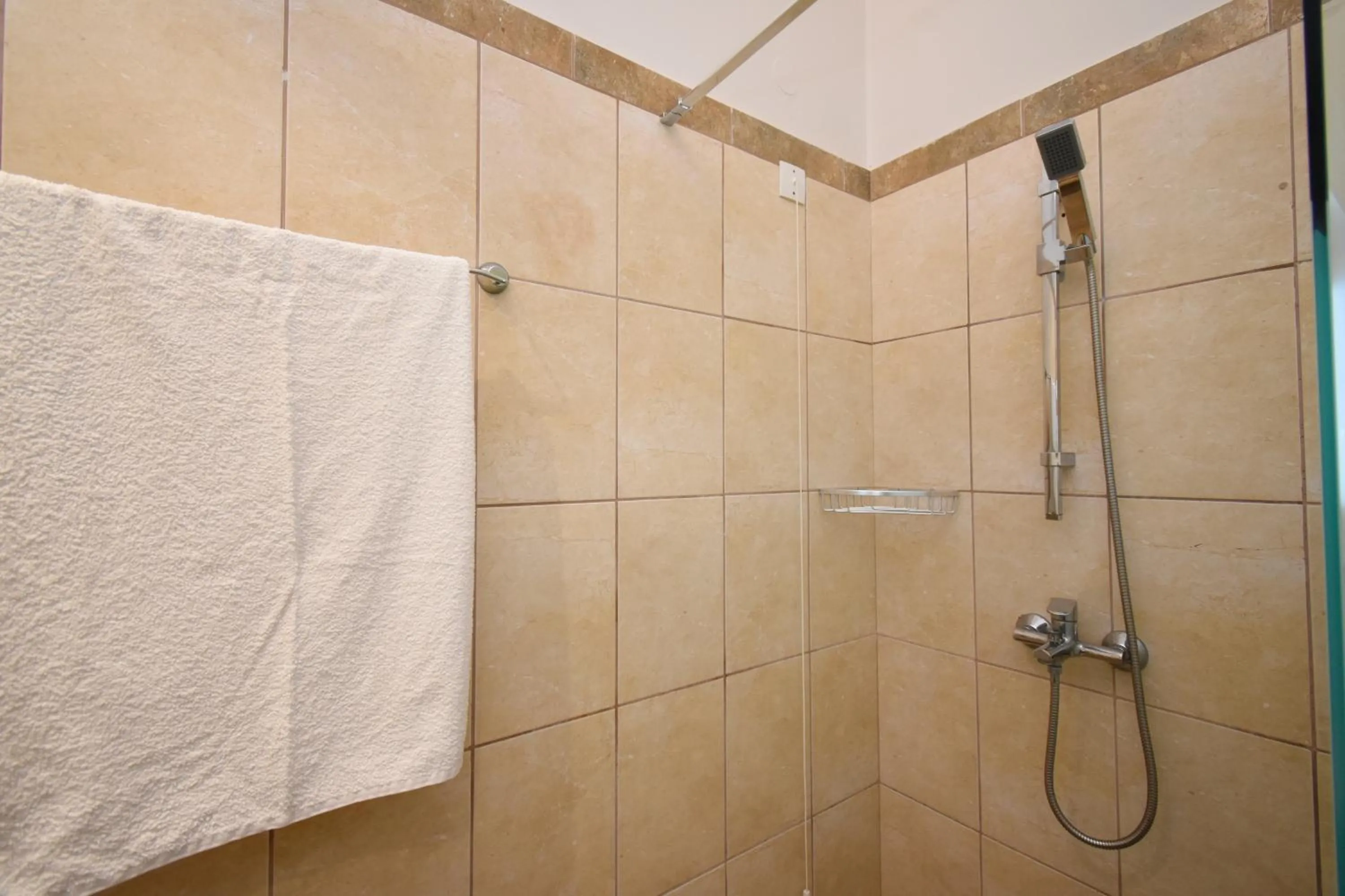 Shower in Elena Village Hotel & Suites