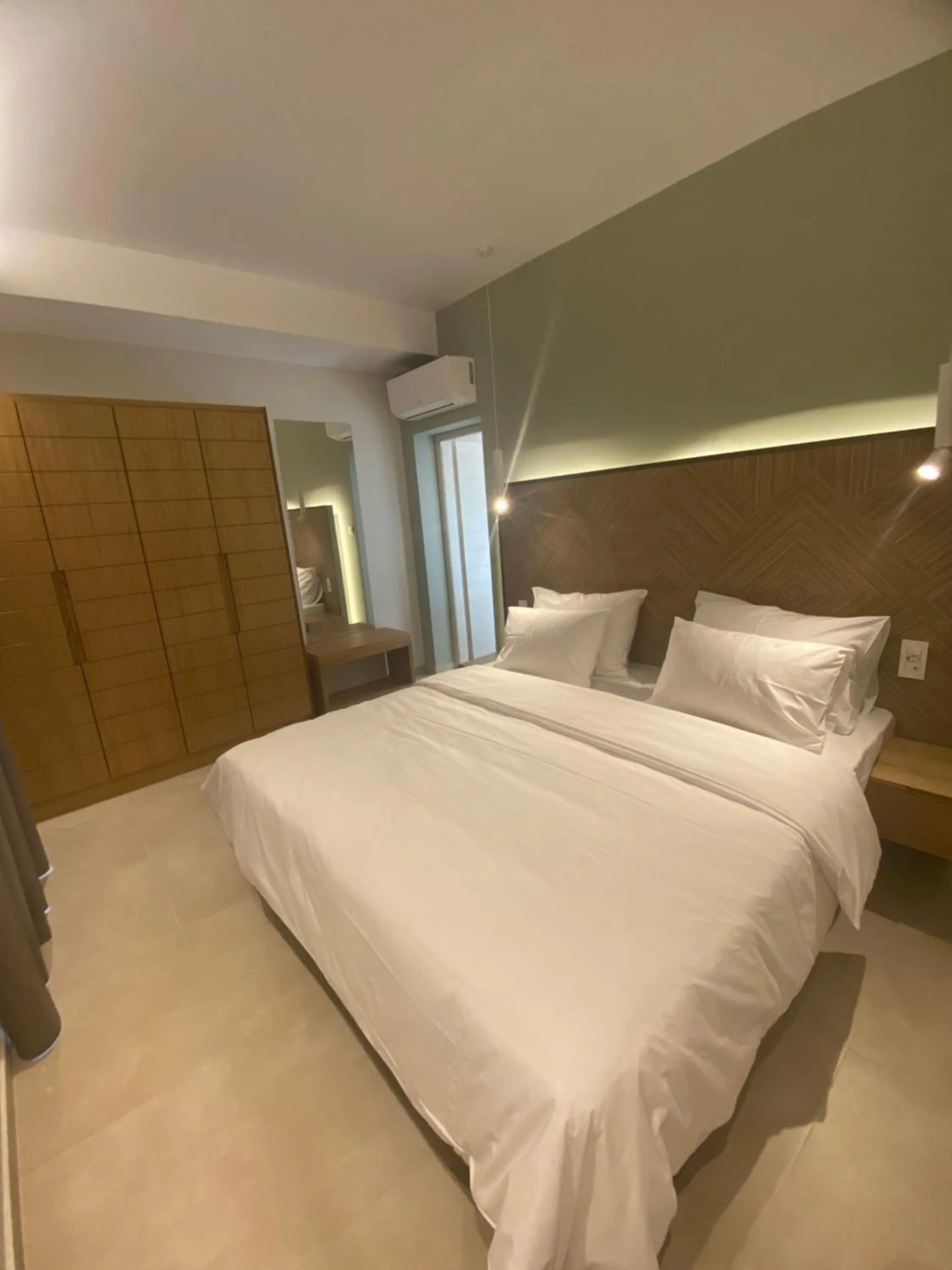 Bed in Elena Village Hotel & Suites