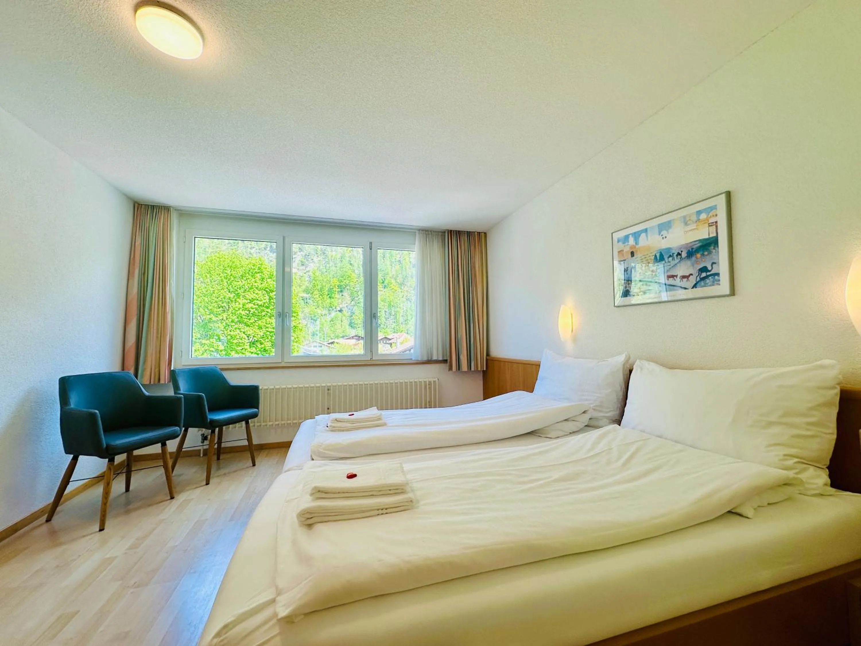 Bed in Hotel Rebstock Meiringen