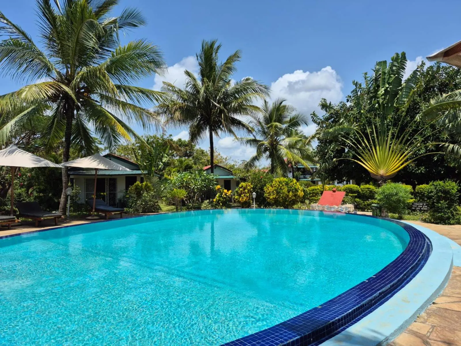 Garden in African Dream Cottages - Diani Beach
