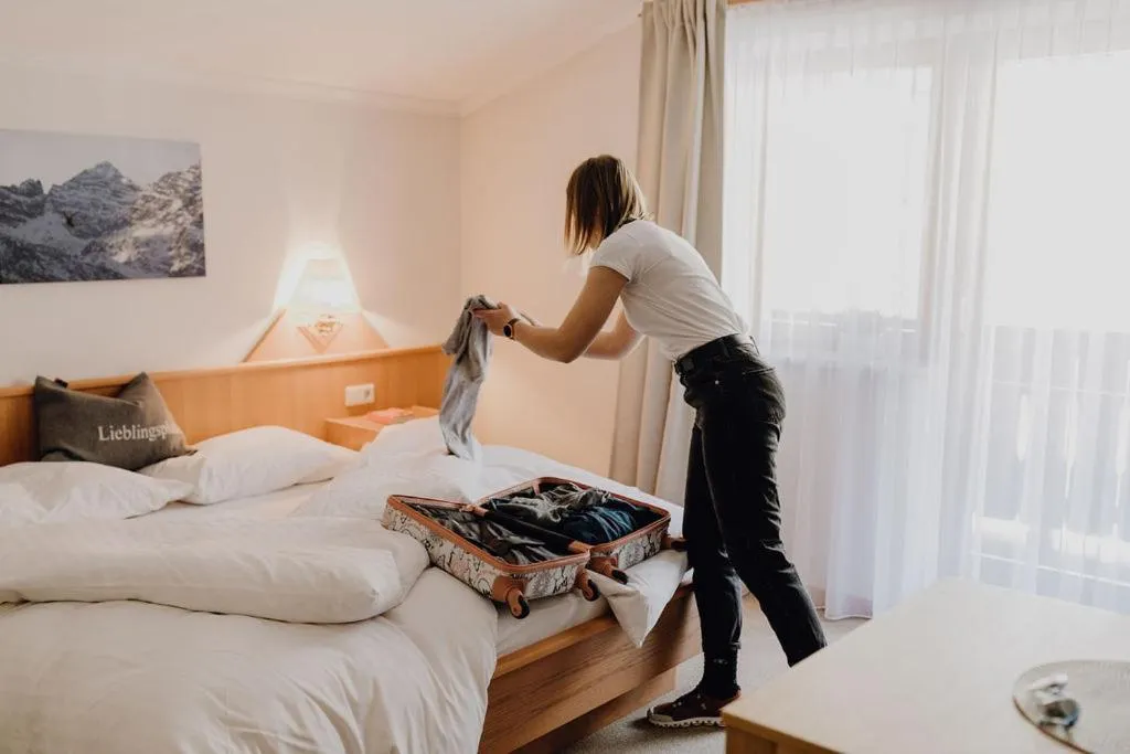 Bedroom, Bed in Dorfcafe Unken Hotelpension sWirtshaus im Dorf