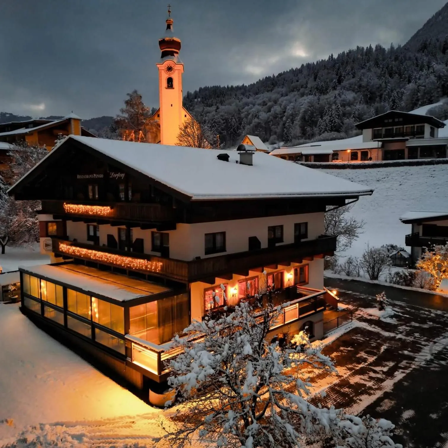 Property building in Dorfcafe Unken Hotelpension sWirtshaus im Dorf