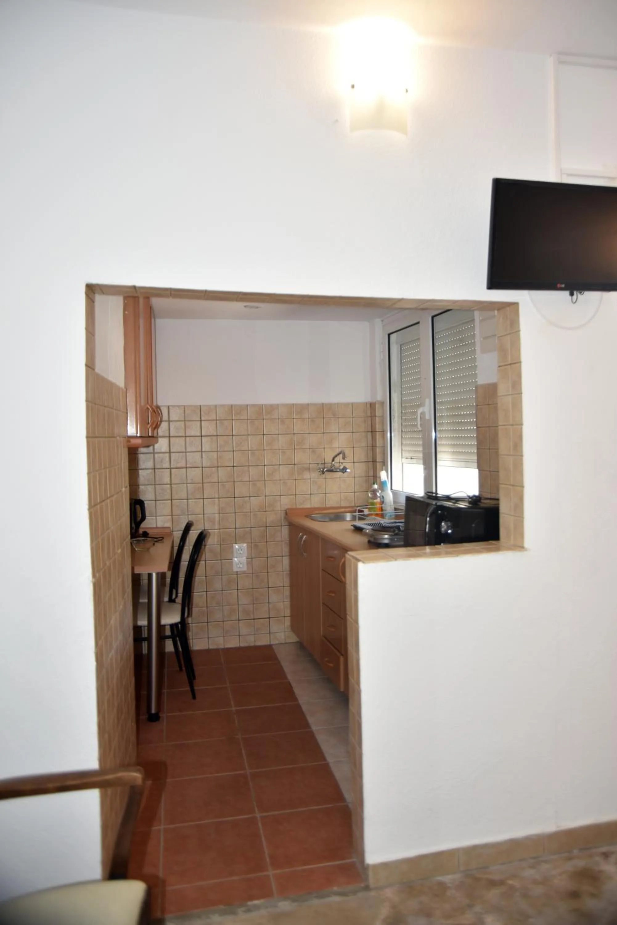 Kitchen or kitchenette in Jimmy's Apartments