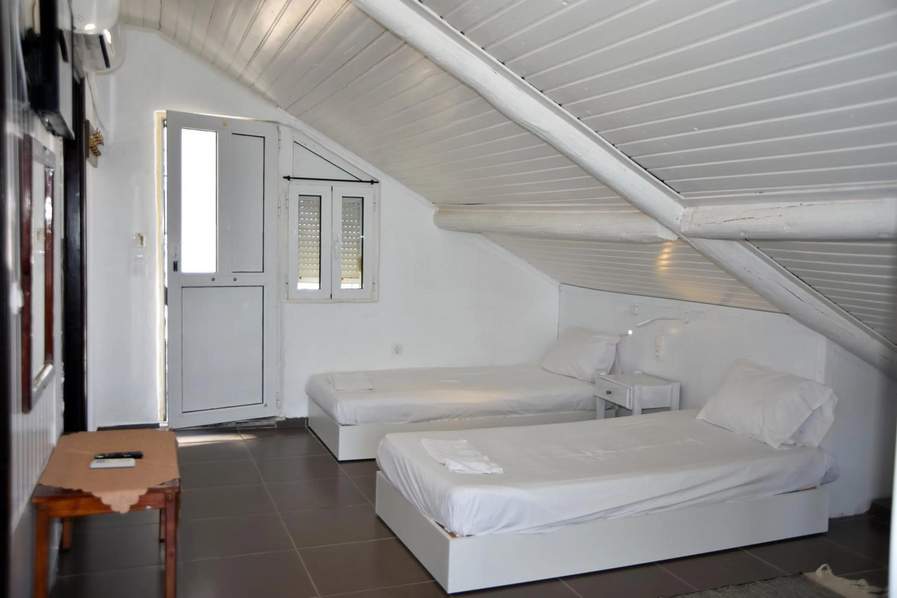 Living room, Bed in Jimmy's Apartments