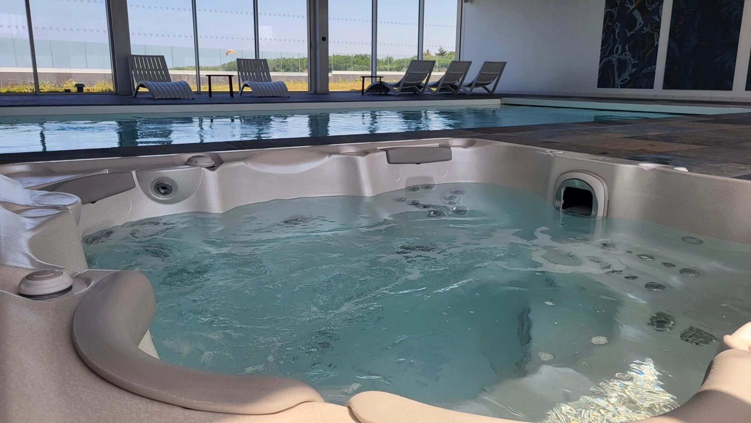 Spa and wellness centre/facilities in Hôtel Le Manoir du Roselier