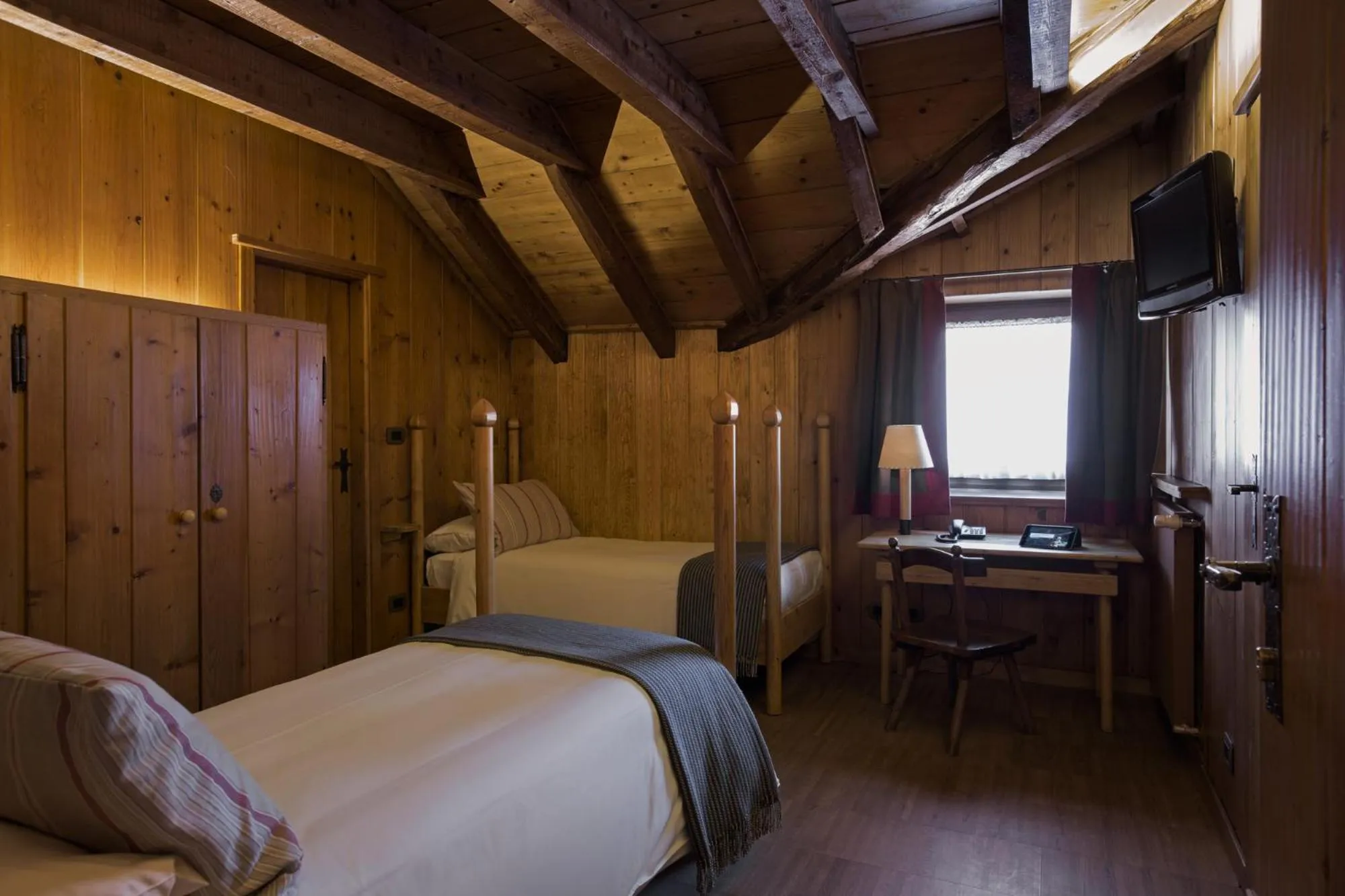 Photo of the whole room, Bed in Albergo Ristorante Bucaneve