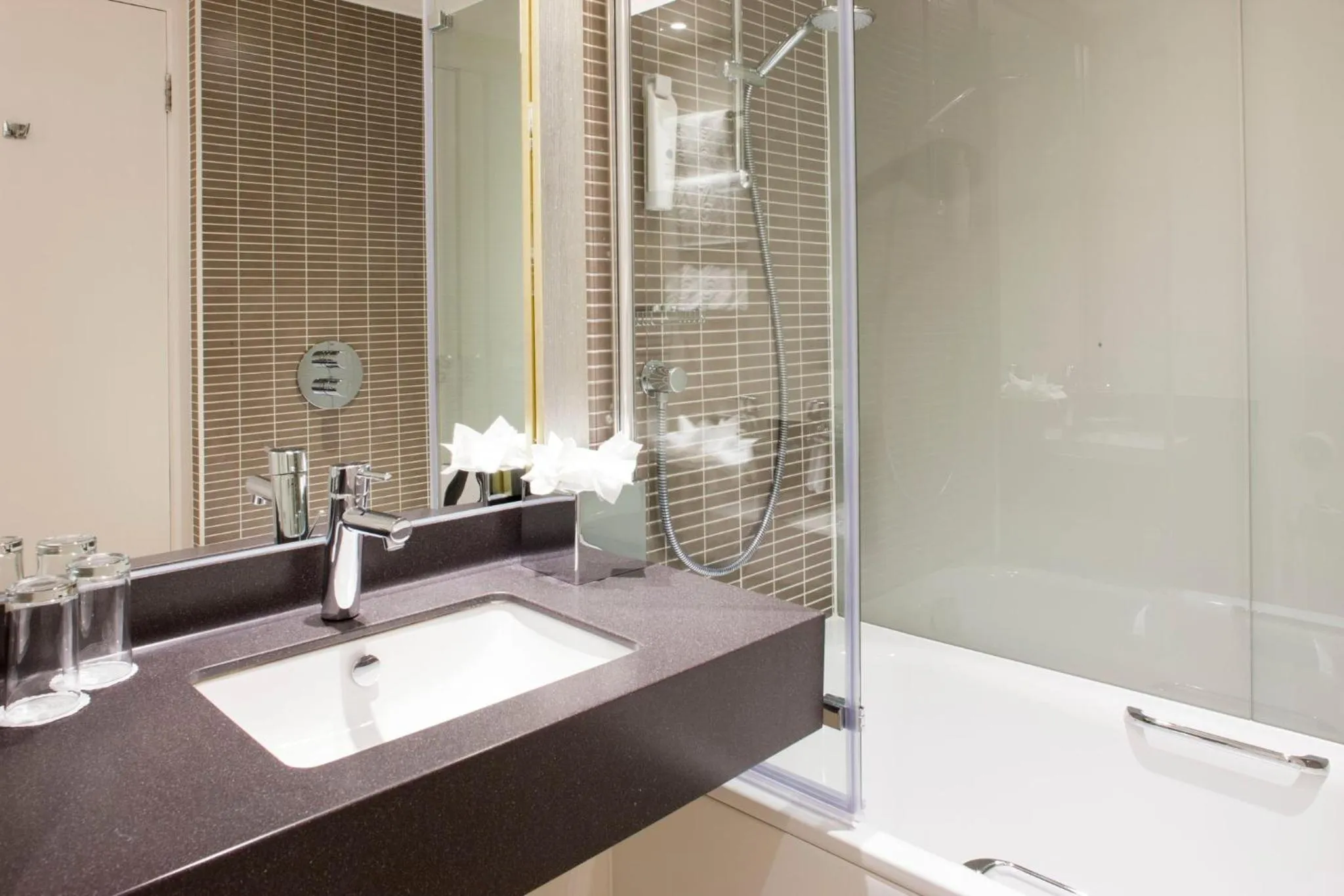 Bathroom in Holiday Inn Leeds Brighouse by IHG