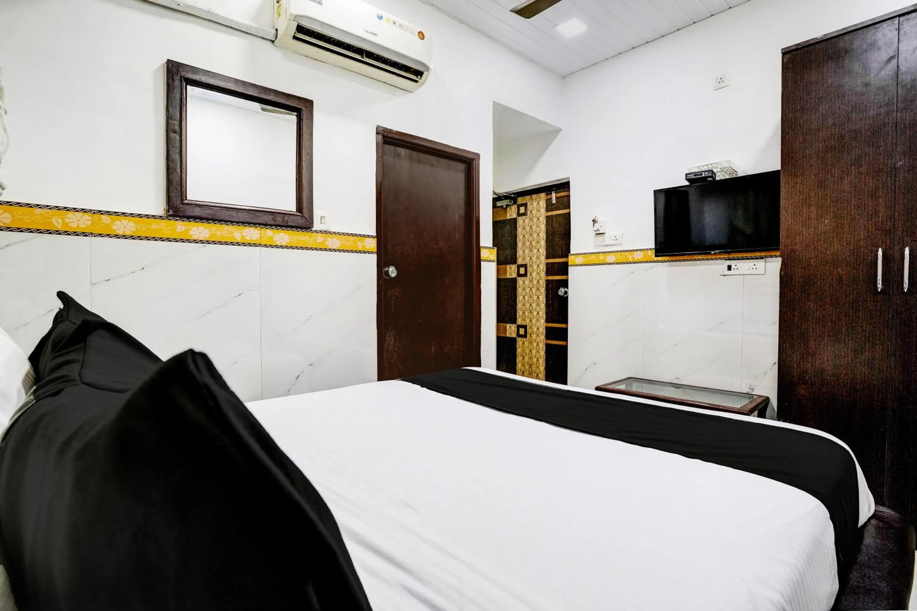 Bathroom, Bed in Hotel O Shree Sai Residency