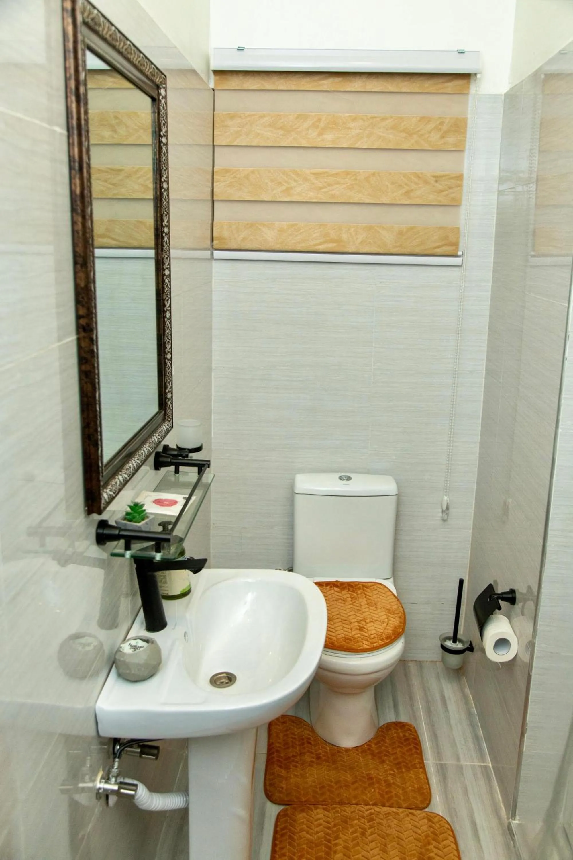 Toilet in BryMac Hotel