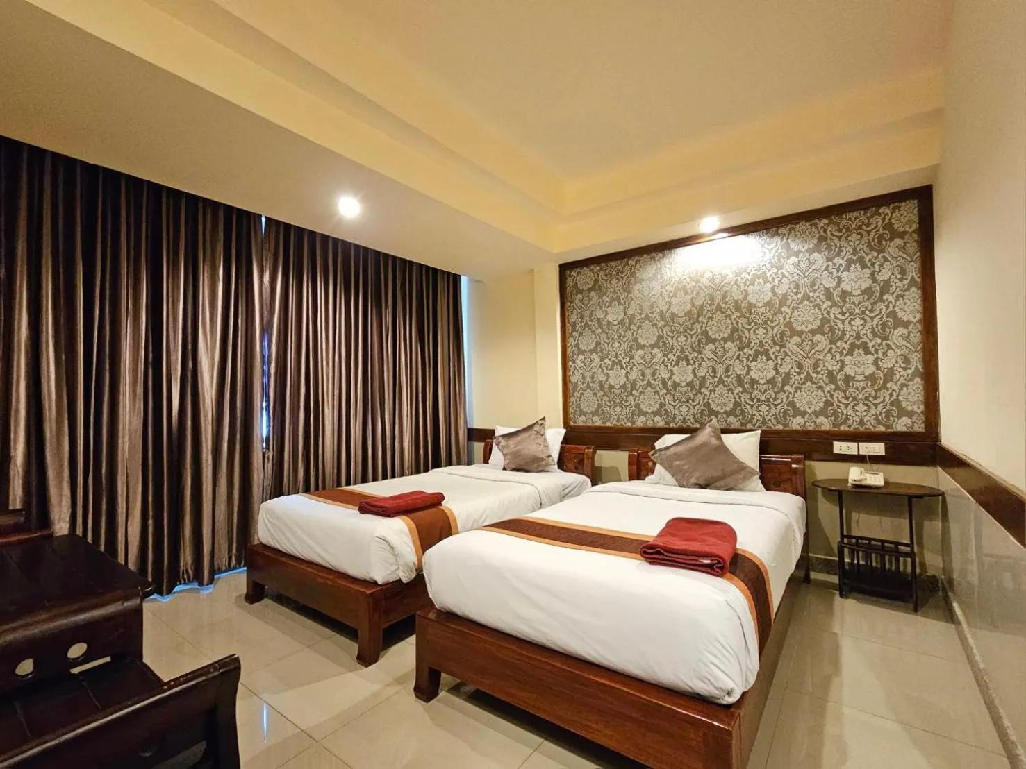 Bed in Boutique Bravo Hotel