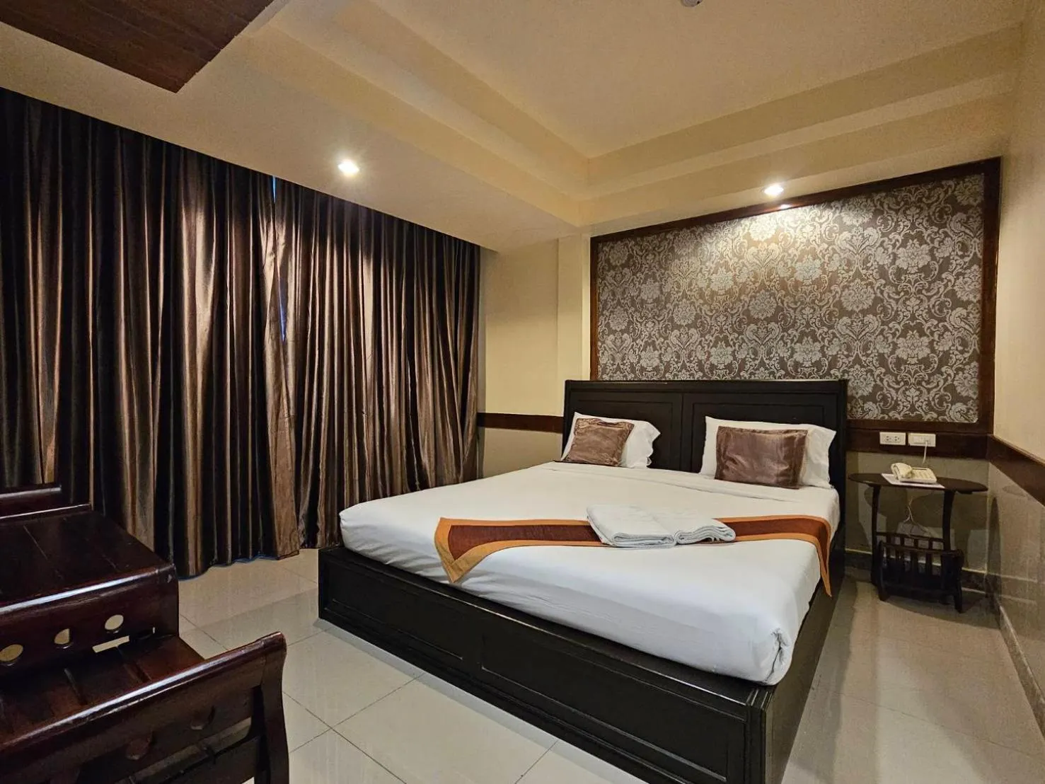 Bed in Boutique Bravo Hotel