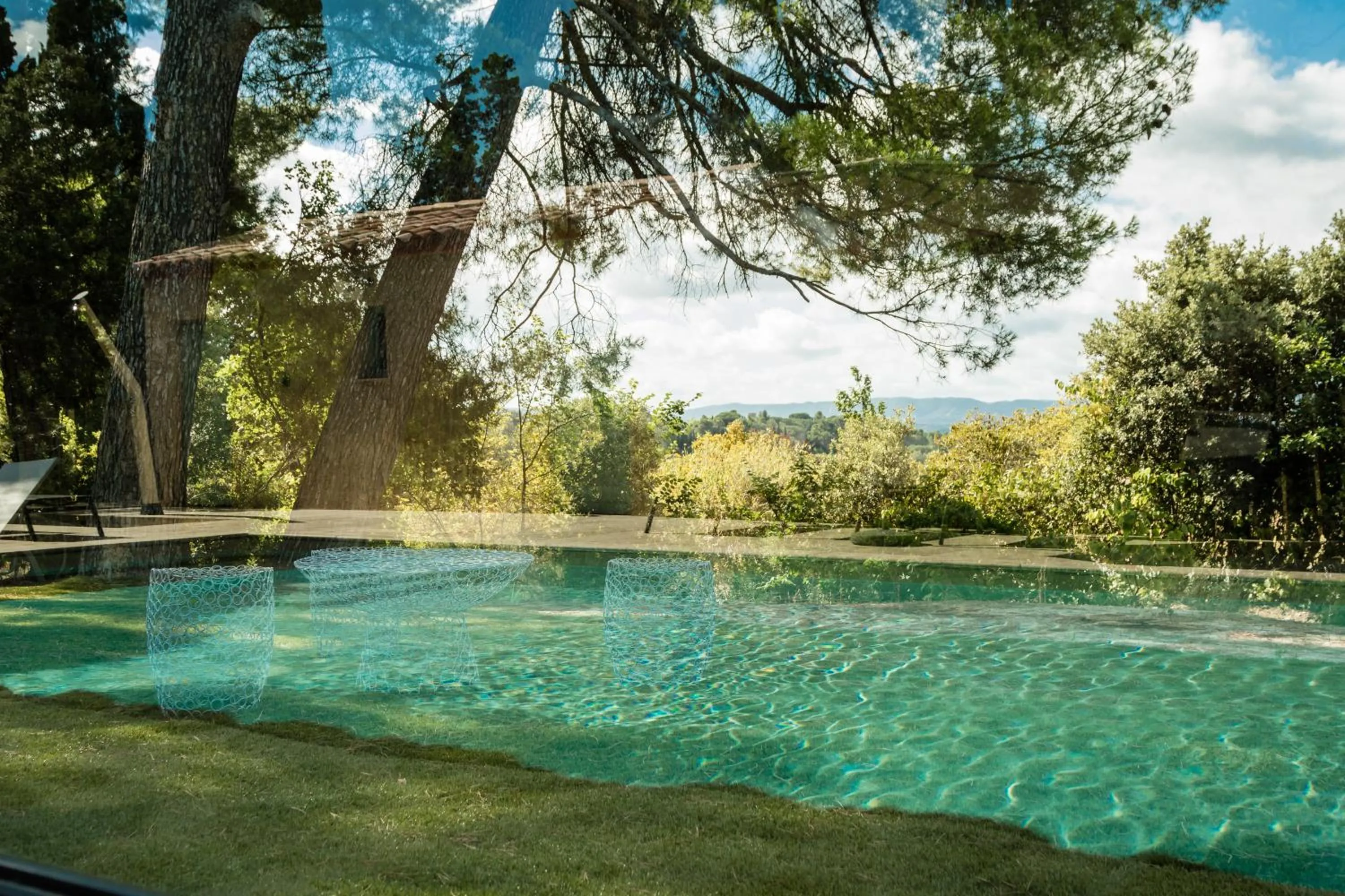 Swimming pool in Les Cabanes Dans Les Bois Logis Hôtel