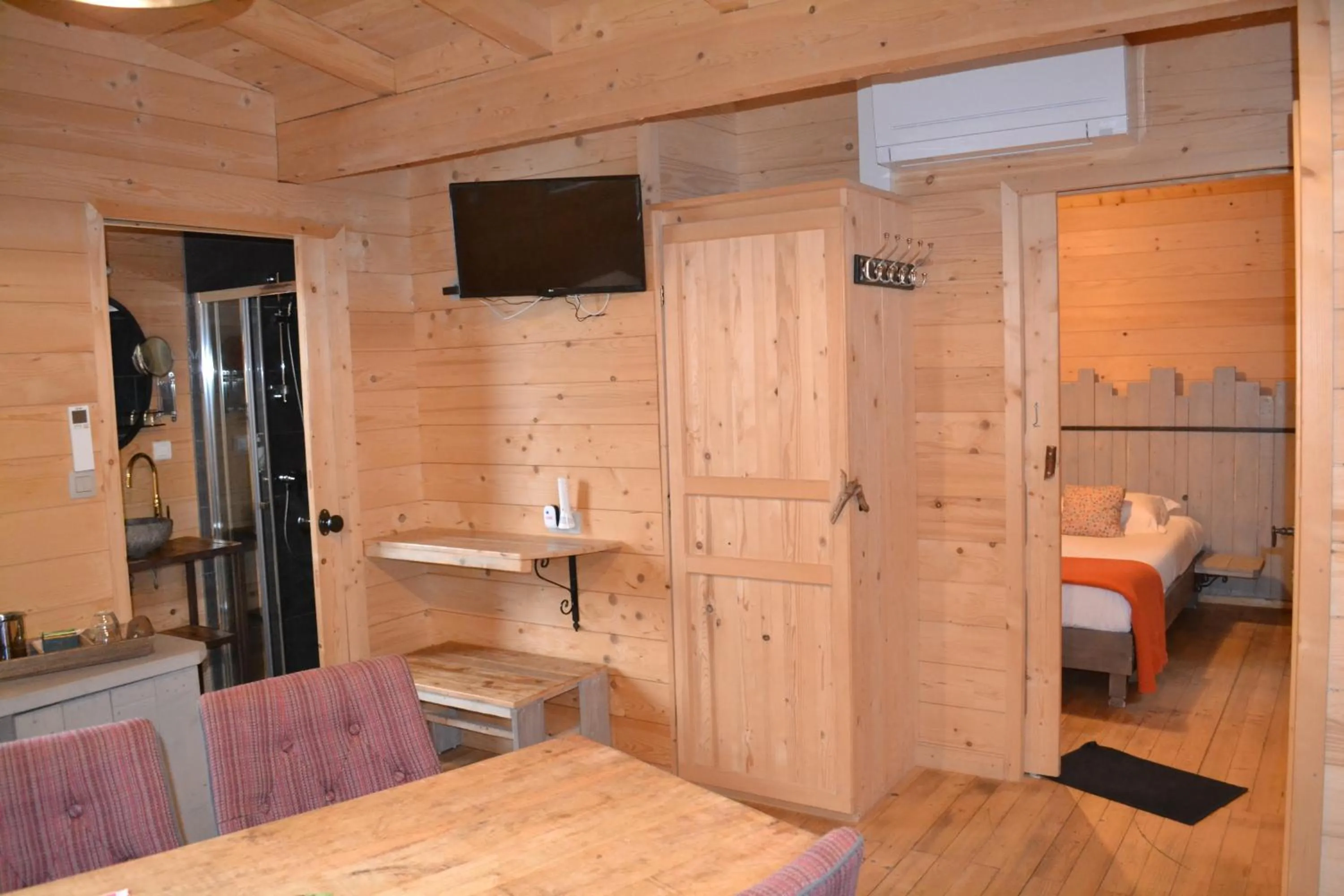 Bedroom in Les Cabanes Dans Les Bois Logis Hôtel