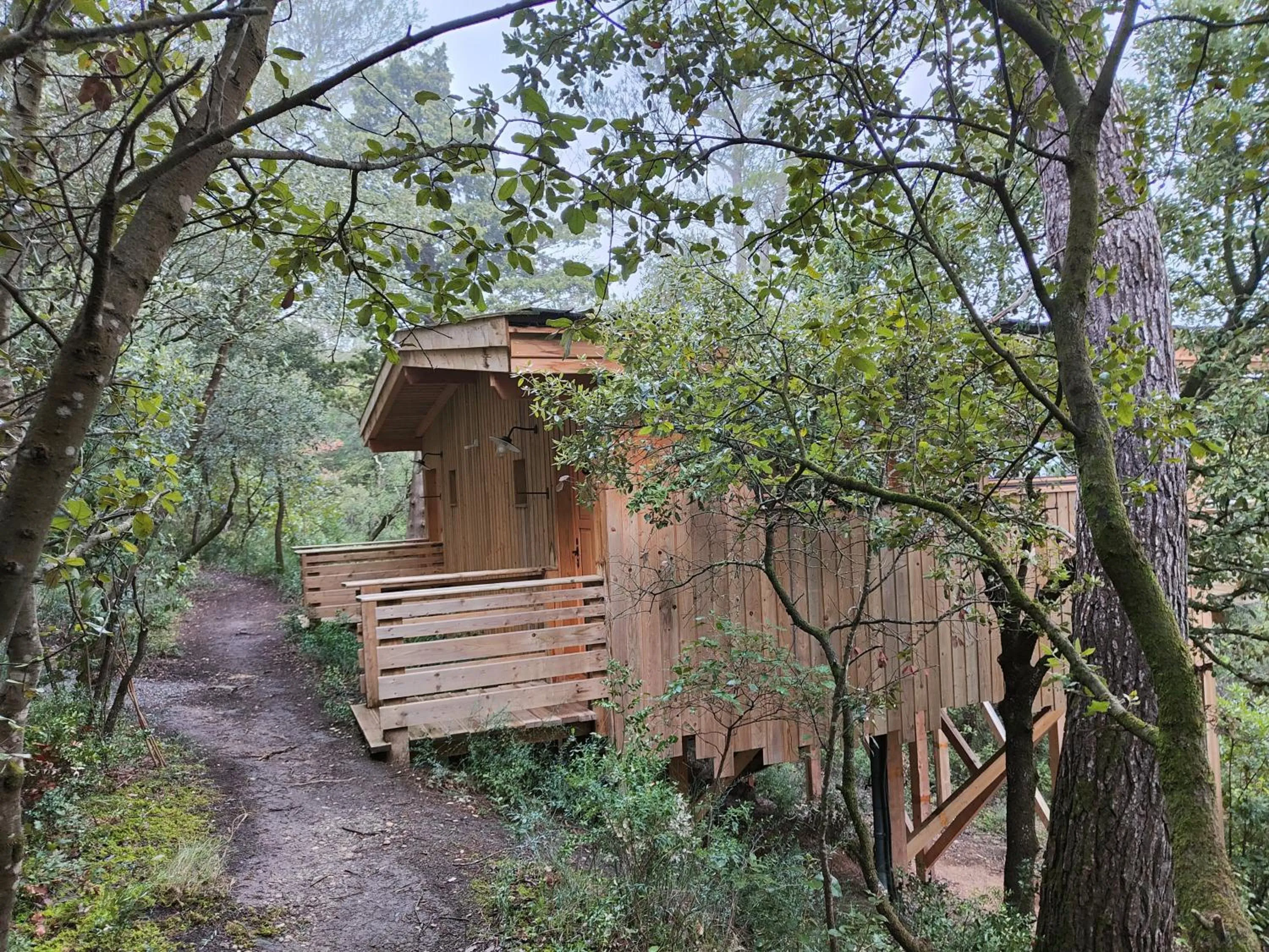 Bedroom in Les Cabanes Dans Les Bois Logis Hôtel