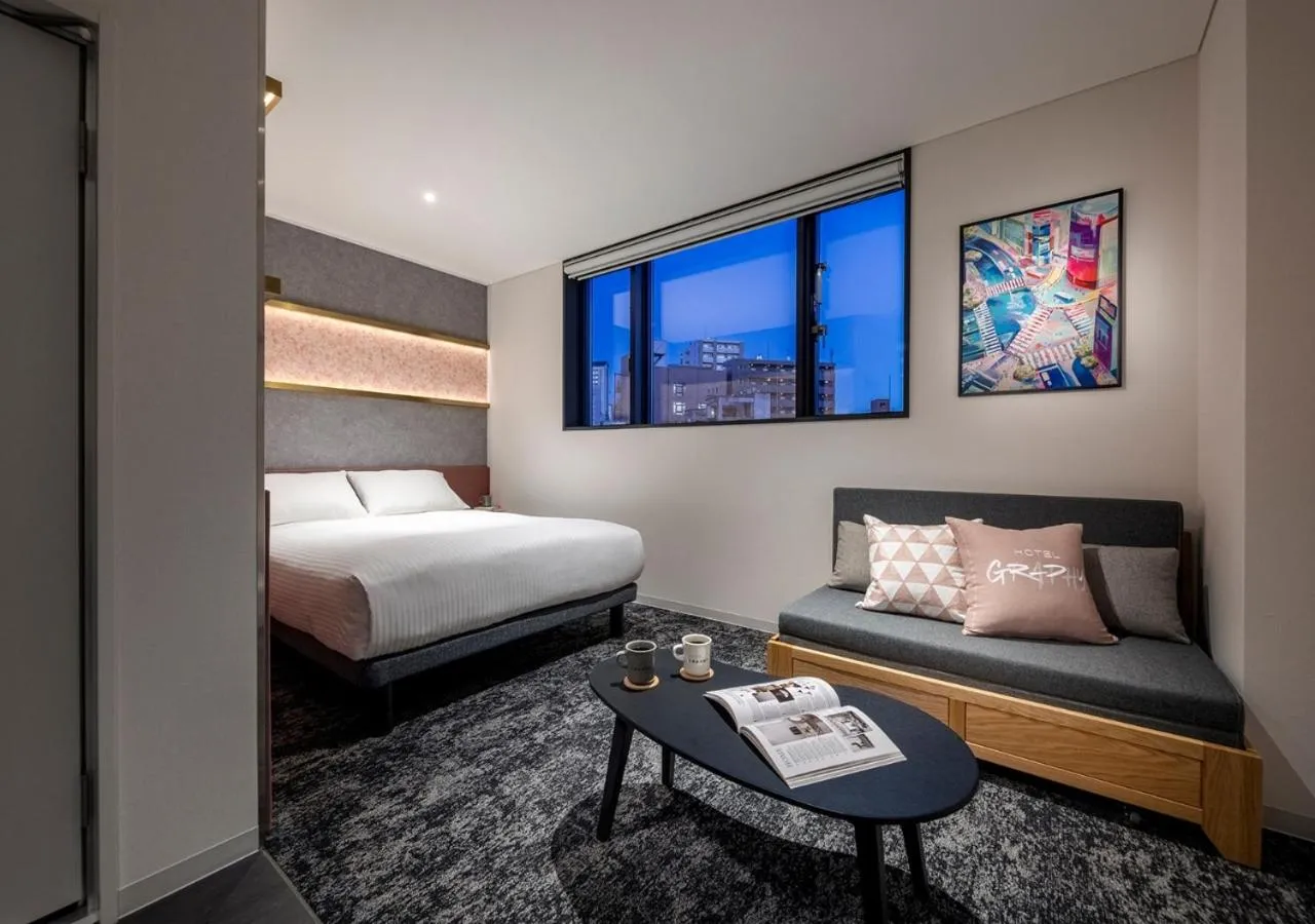 Bed in HOTEL GRAPHY Shibuya