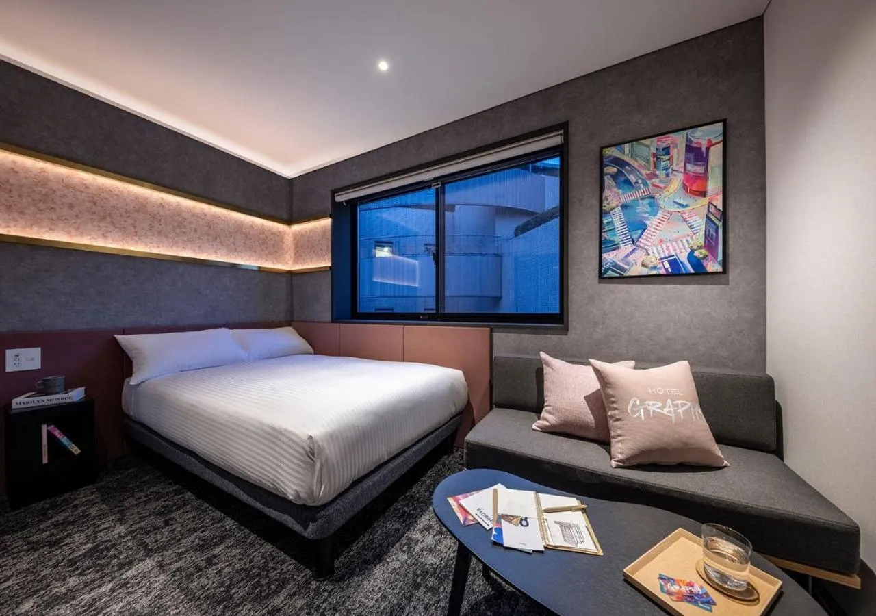 Bed in HOTEL GRAPHY Shibuya
