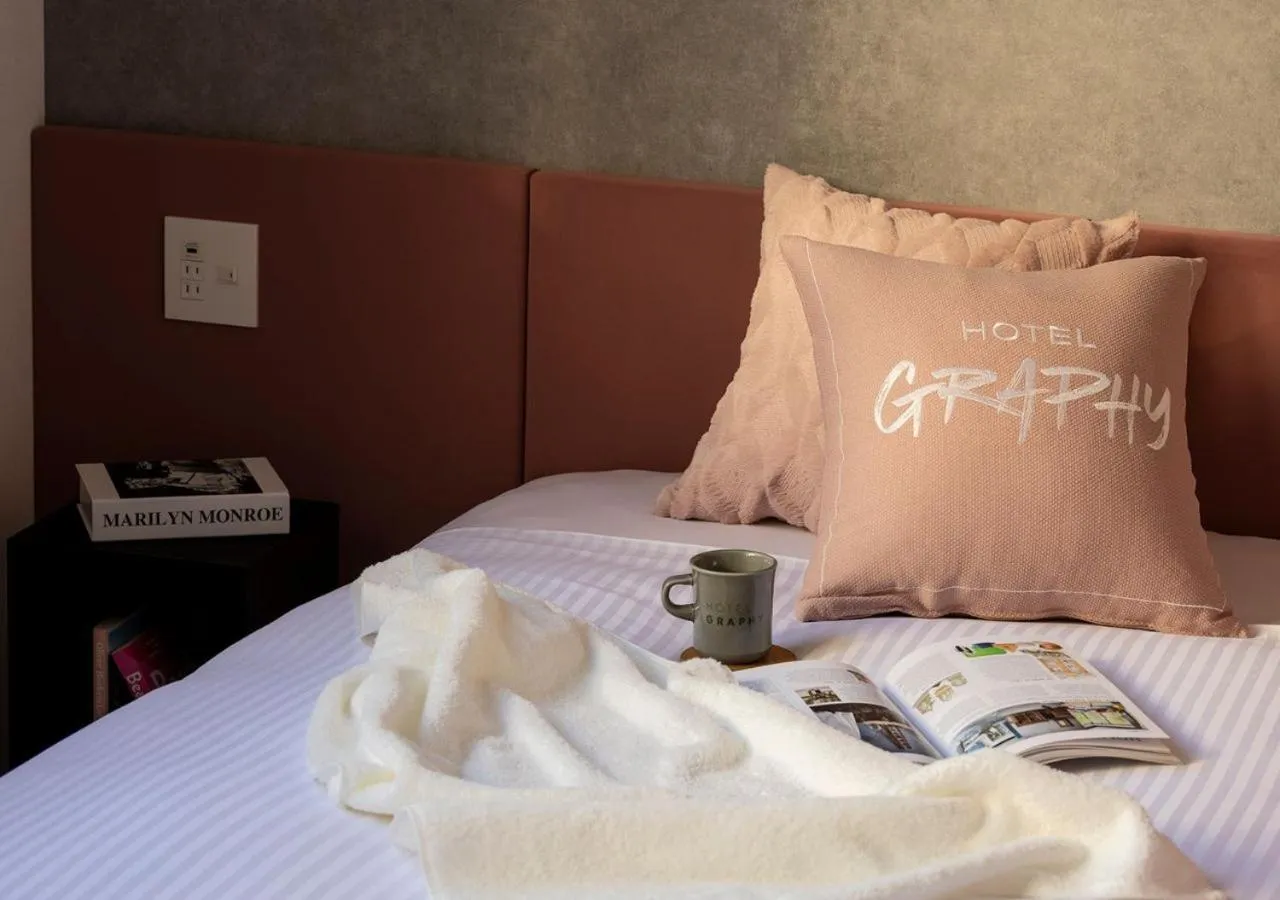 Bed in HOTEL GRAPHY Shibuya