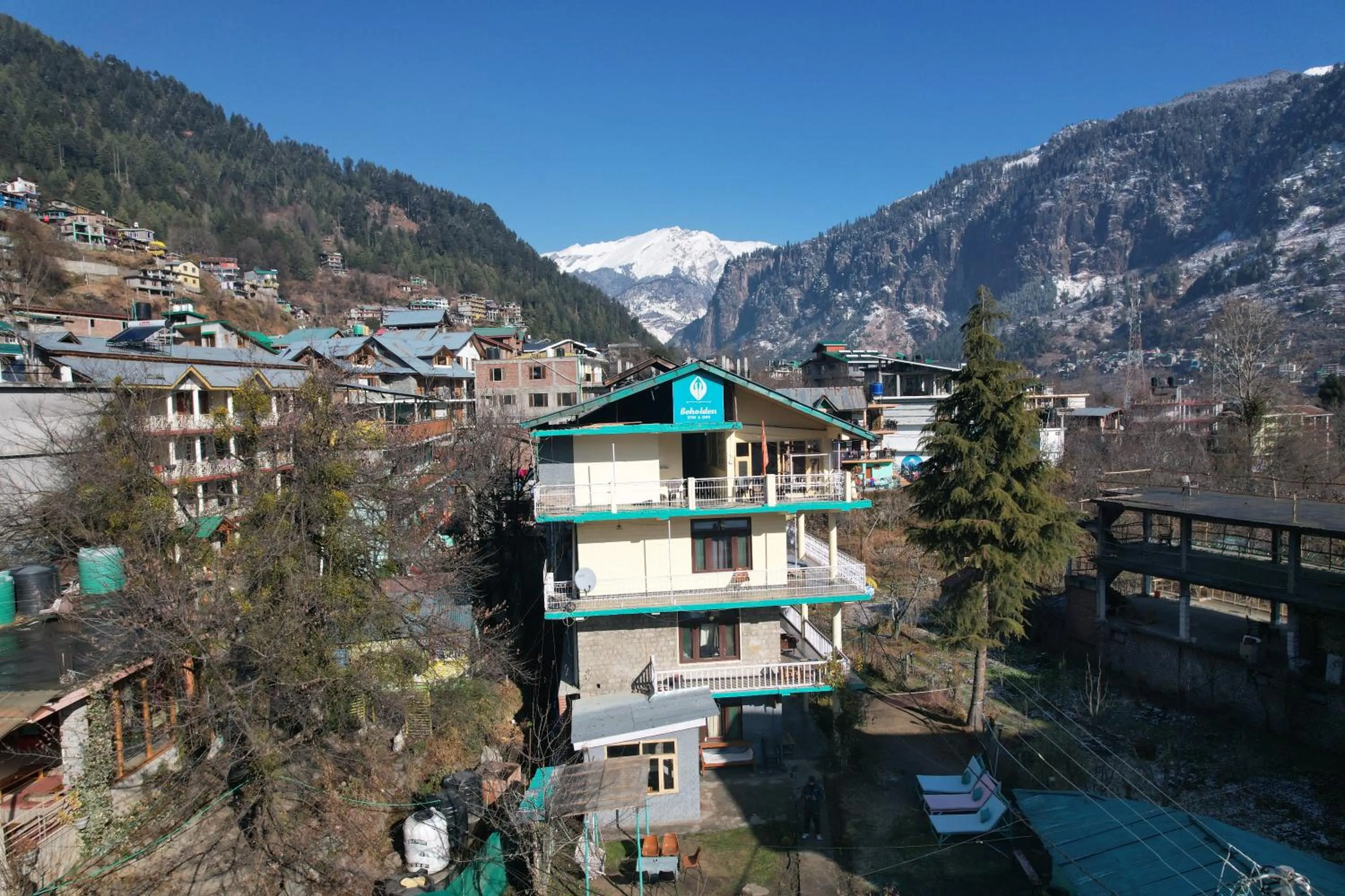 Property building in Beholden Stay And Cafe - A Luxury Boutique Hotel In Manali