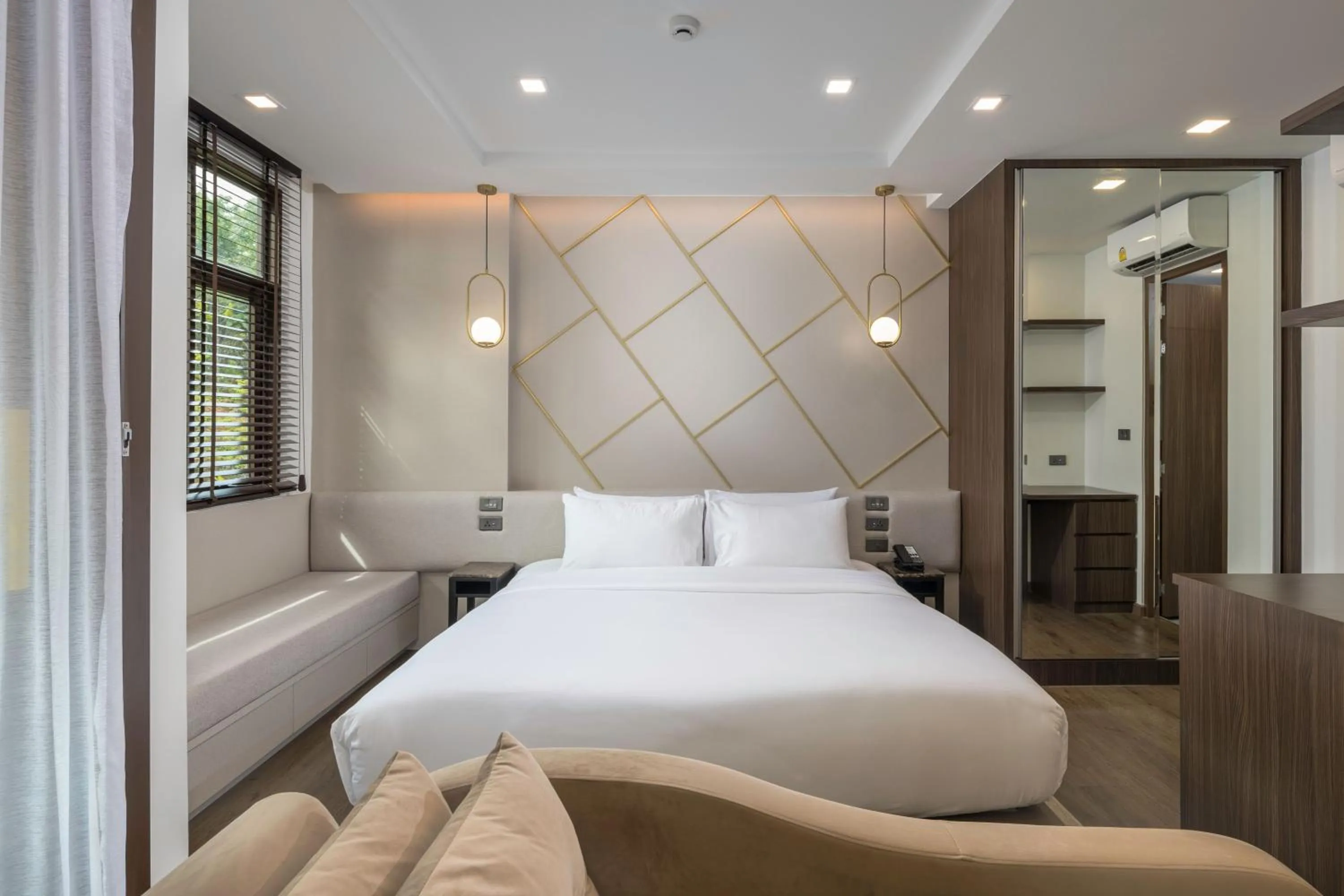 Bed in The Proud Karon Beach Phuket Trademark Collection By Wyndham