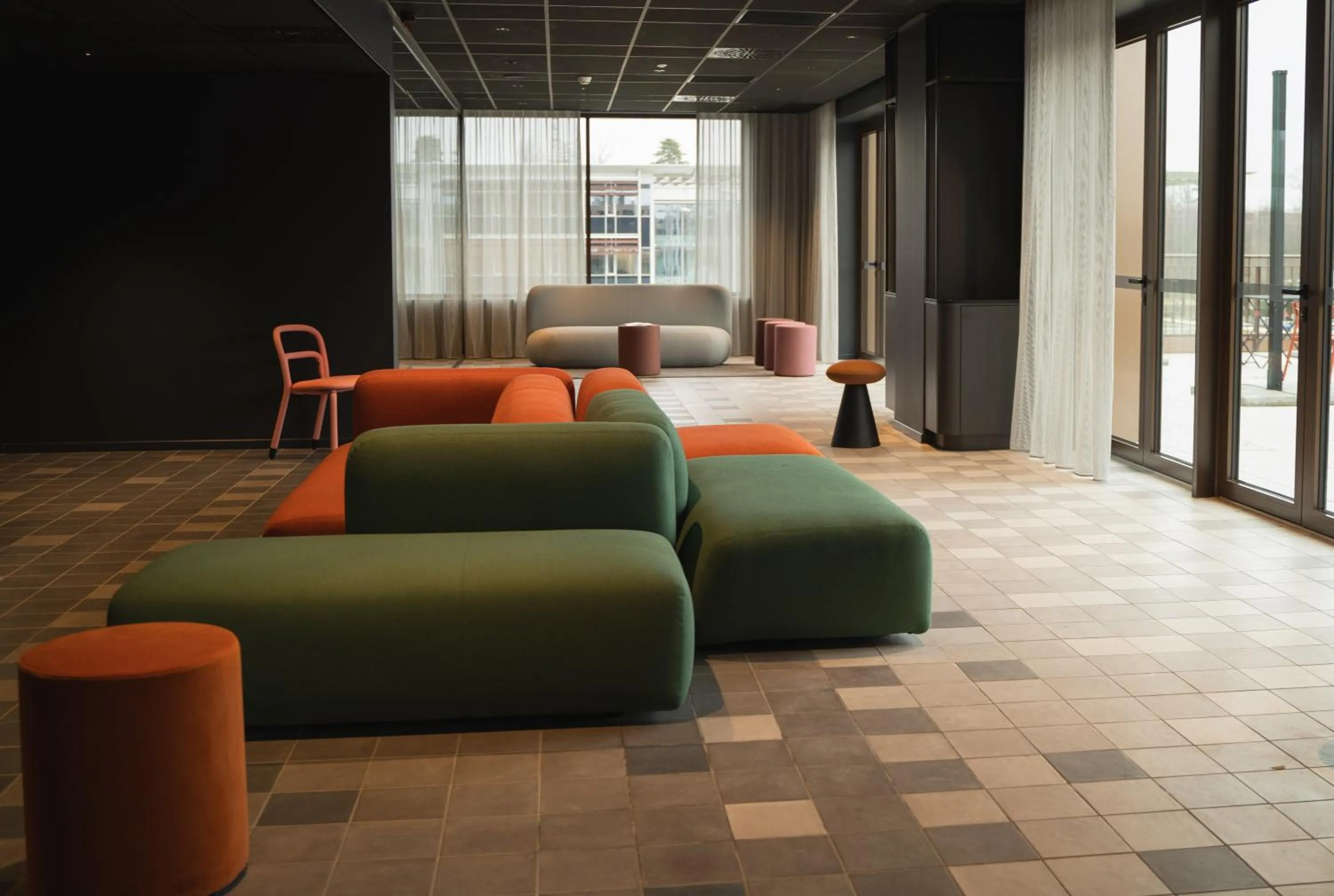 Seating area in TRIBE Milano Malpensa