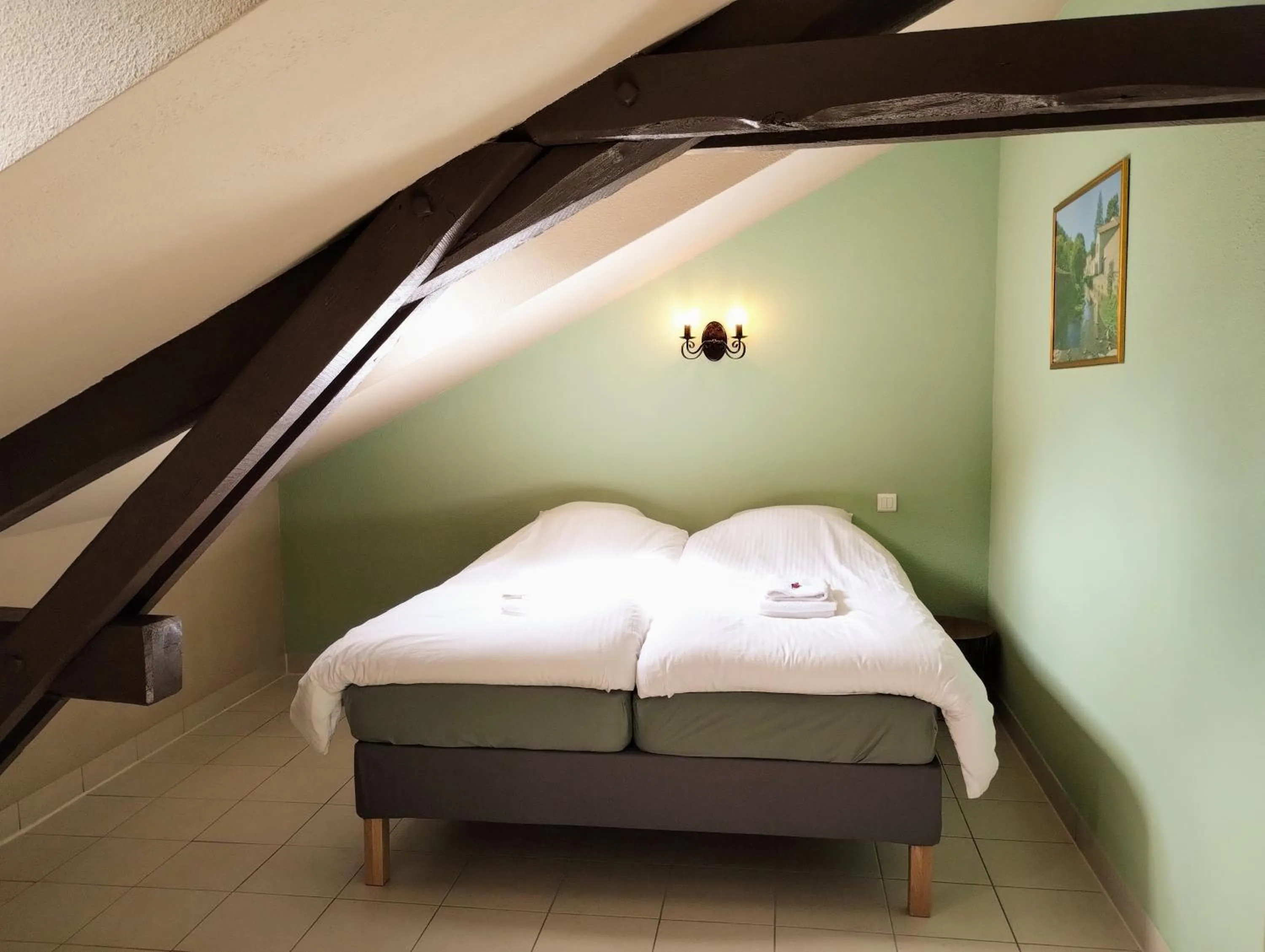 Bed in Hotel Rêve de la Vallée