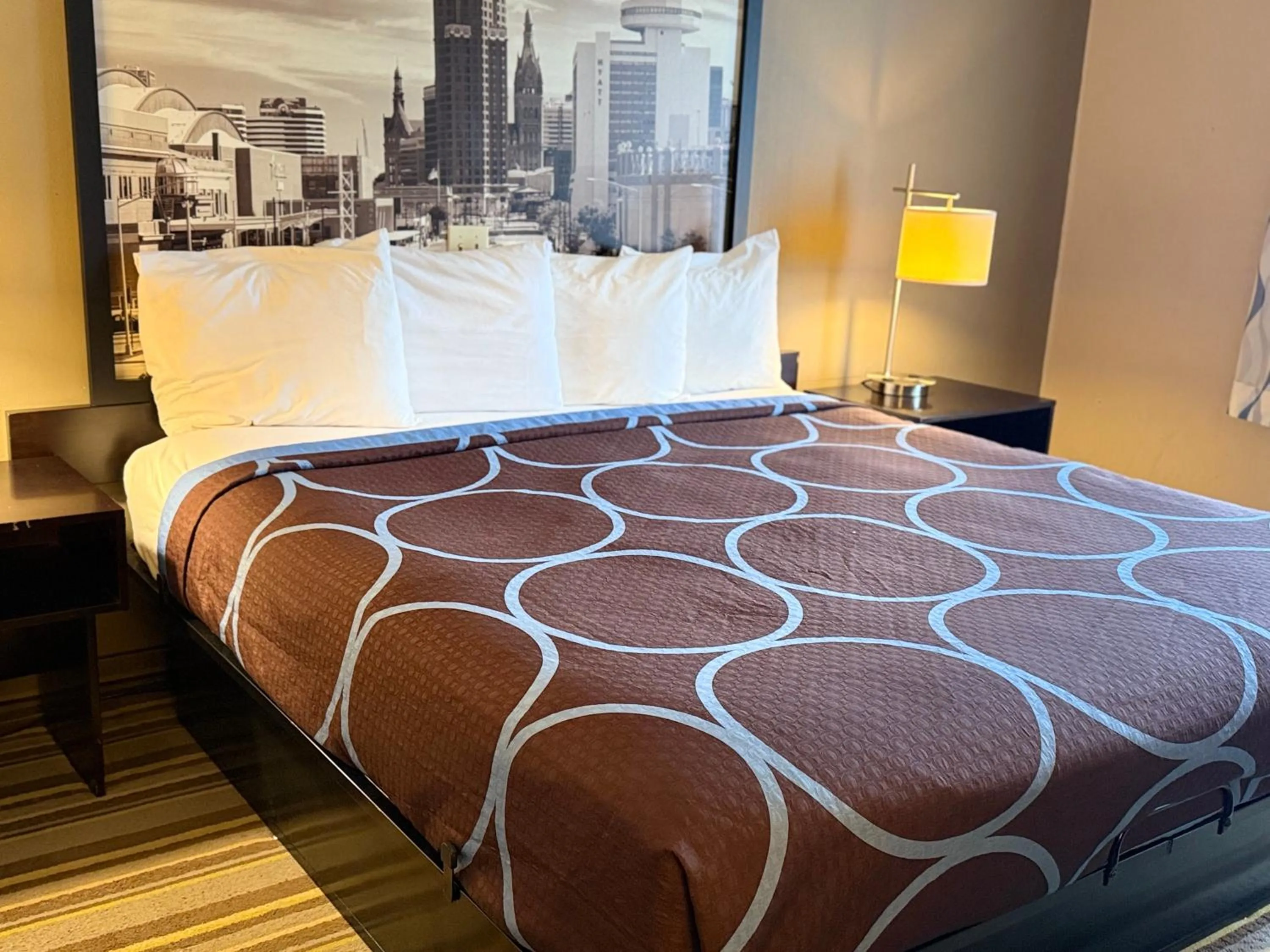 Bed in Delavan Inn and Suites