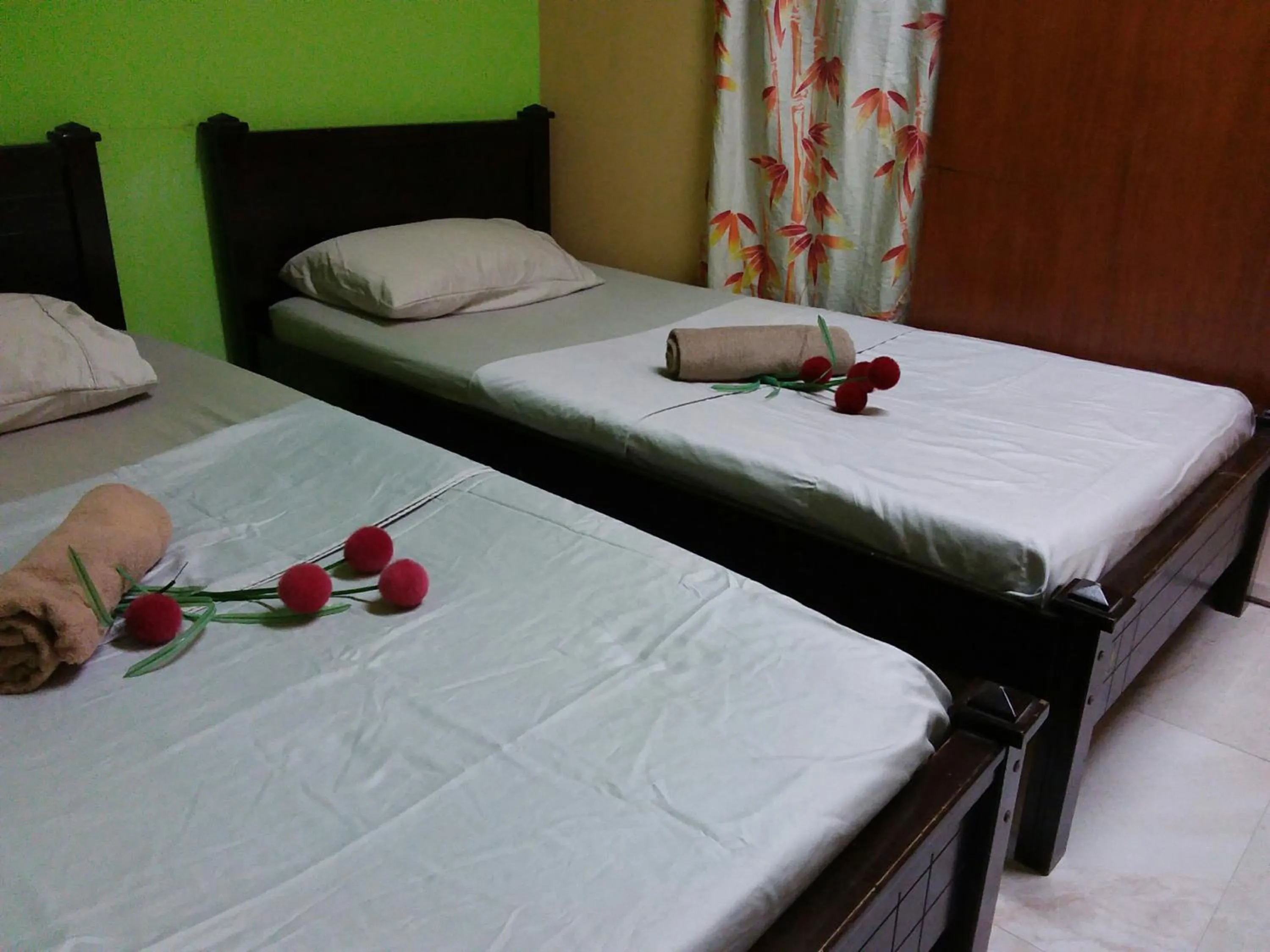 Bed in Oasis Guest House