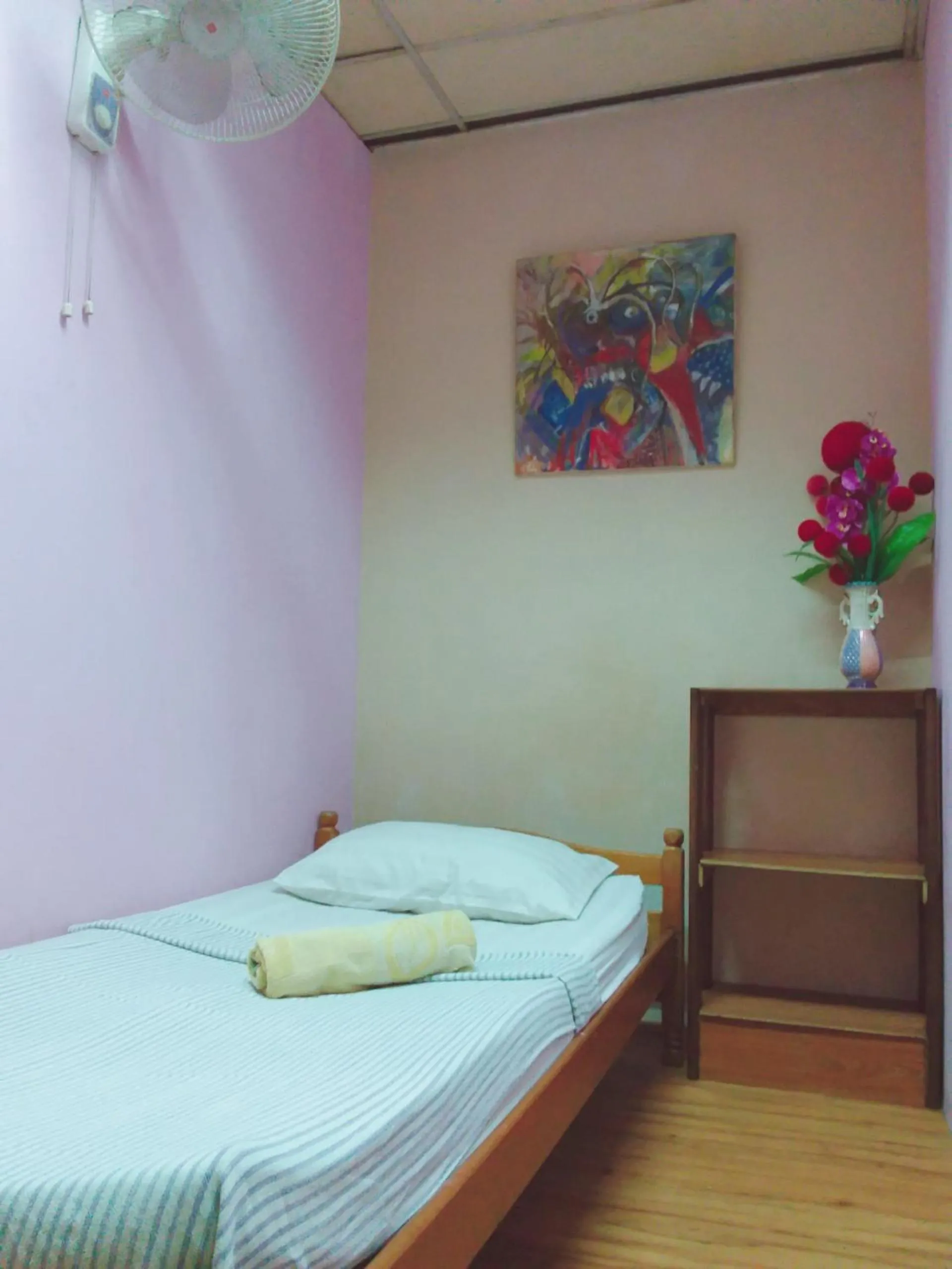 Bed in Oasis Guest House