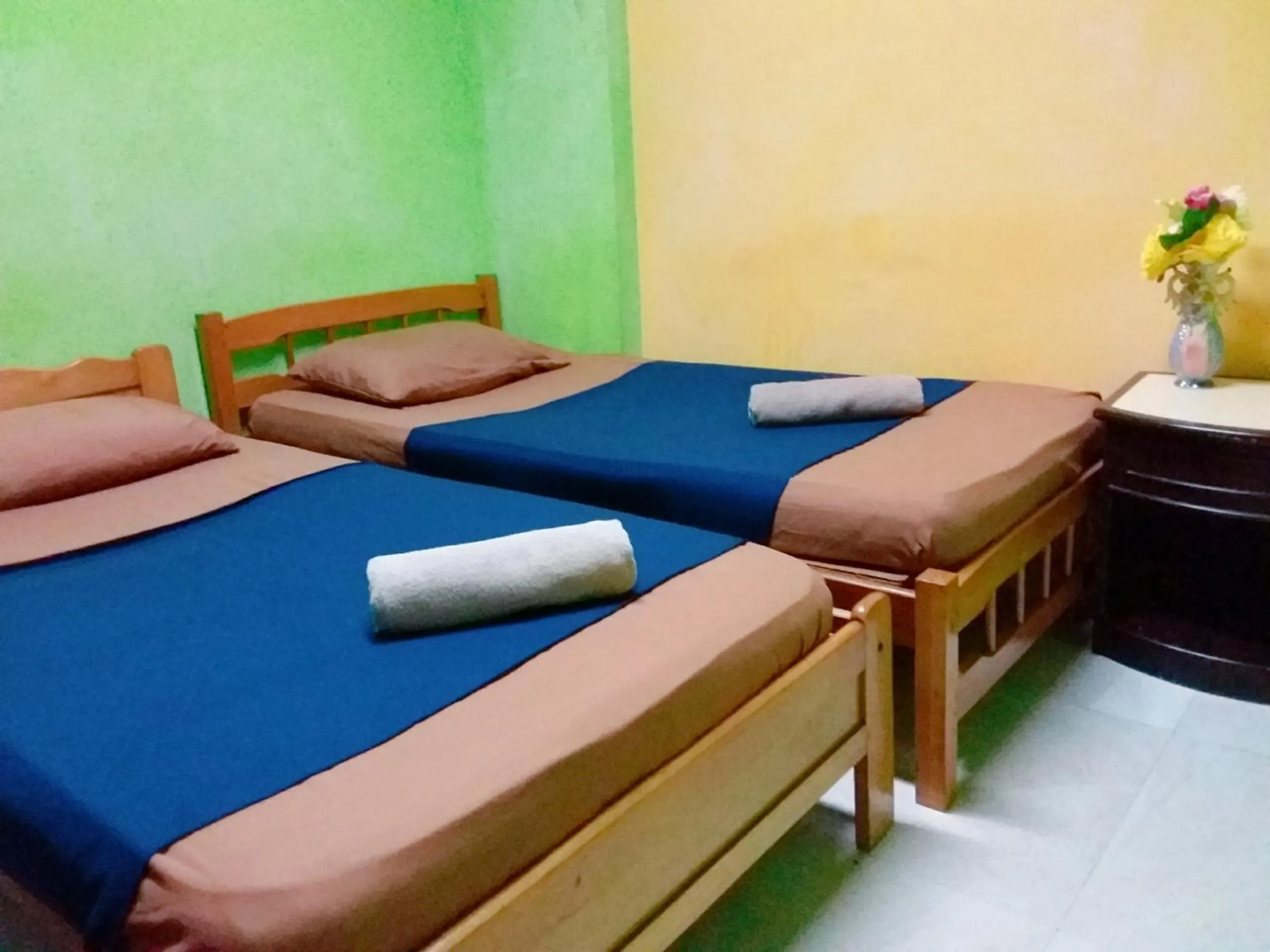 Bed in Oasis Guest House