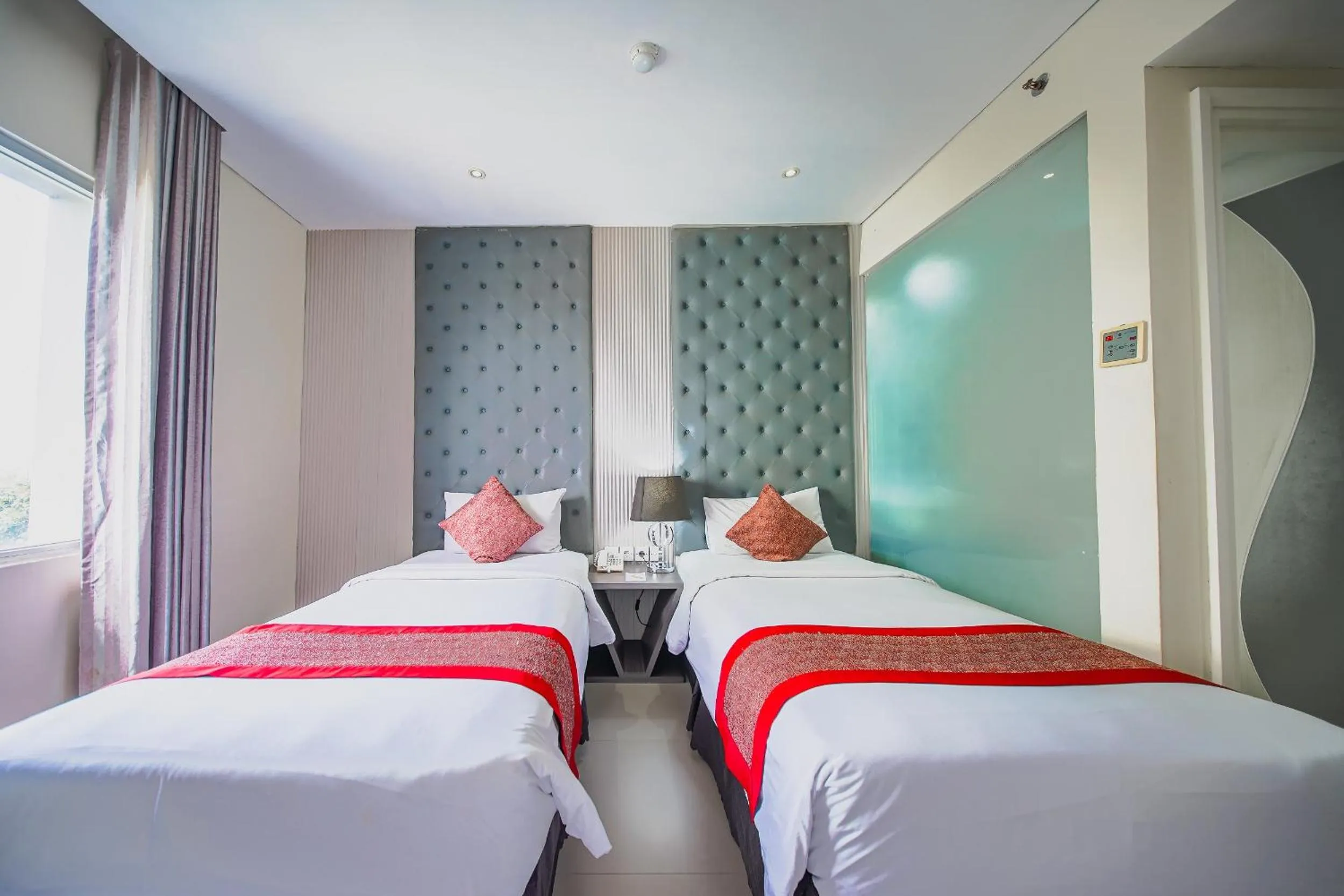 Bed in Serela Cihampelas by KAGUM Hotels