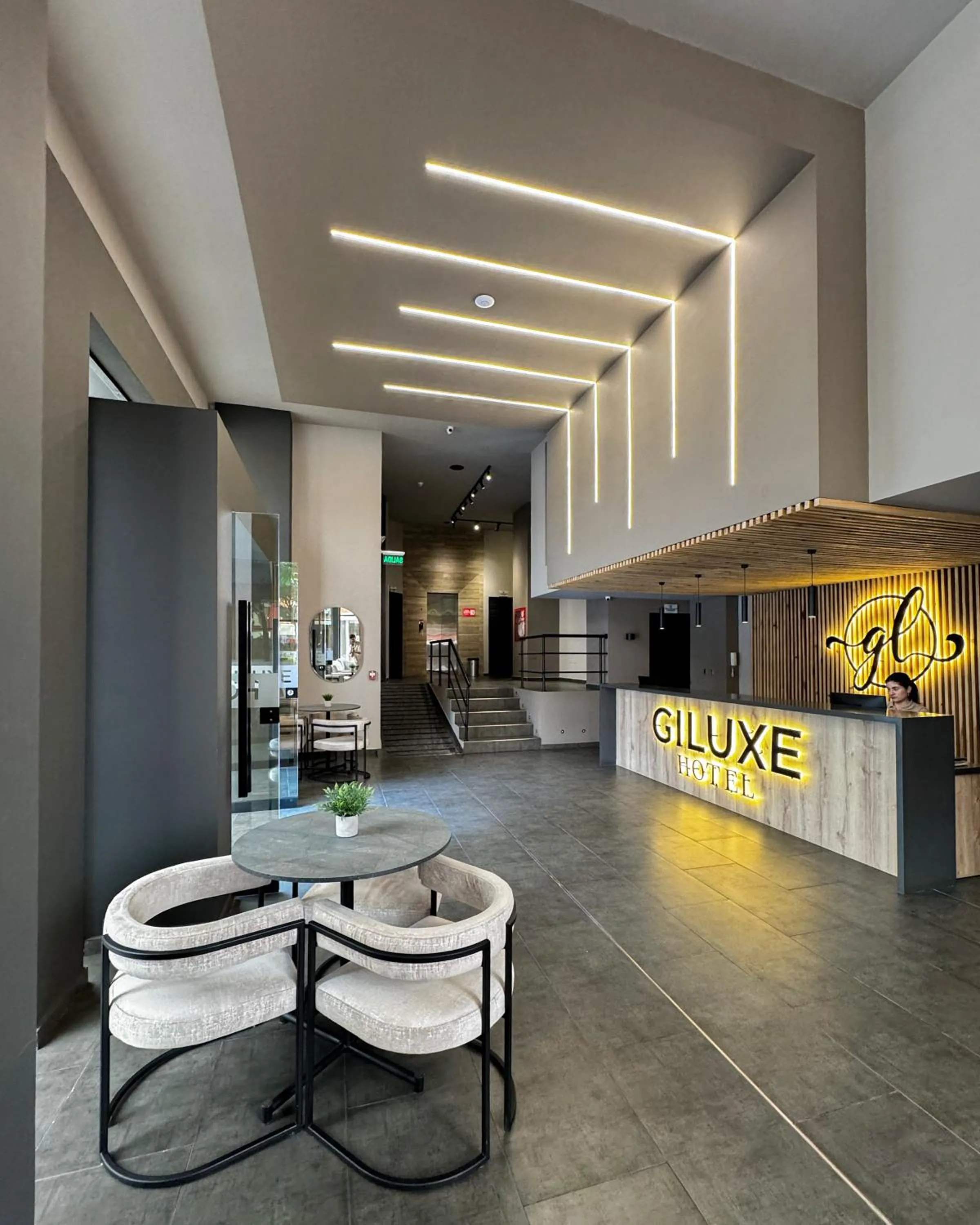 Lobby or reception in Giluxe Hotel