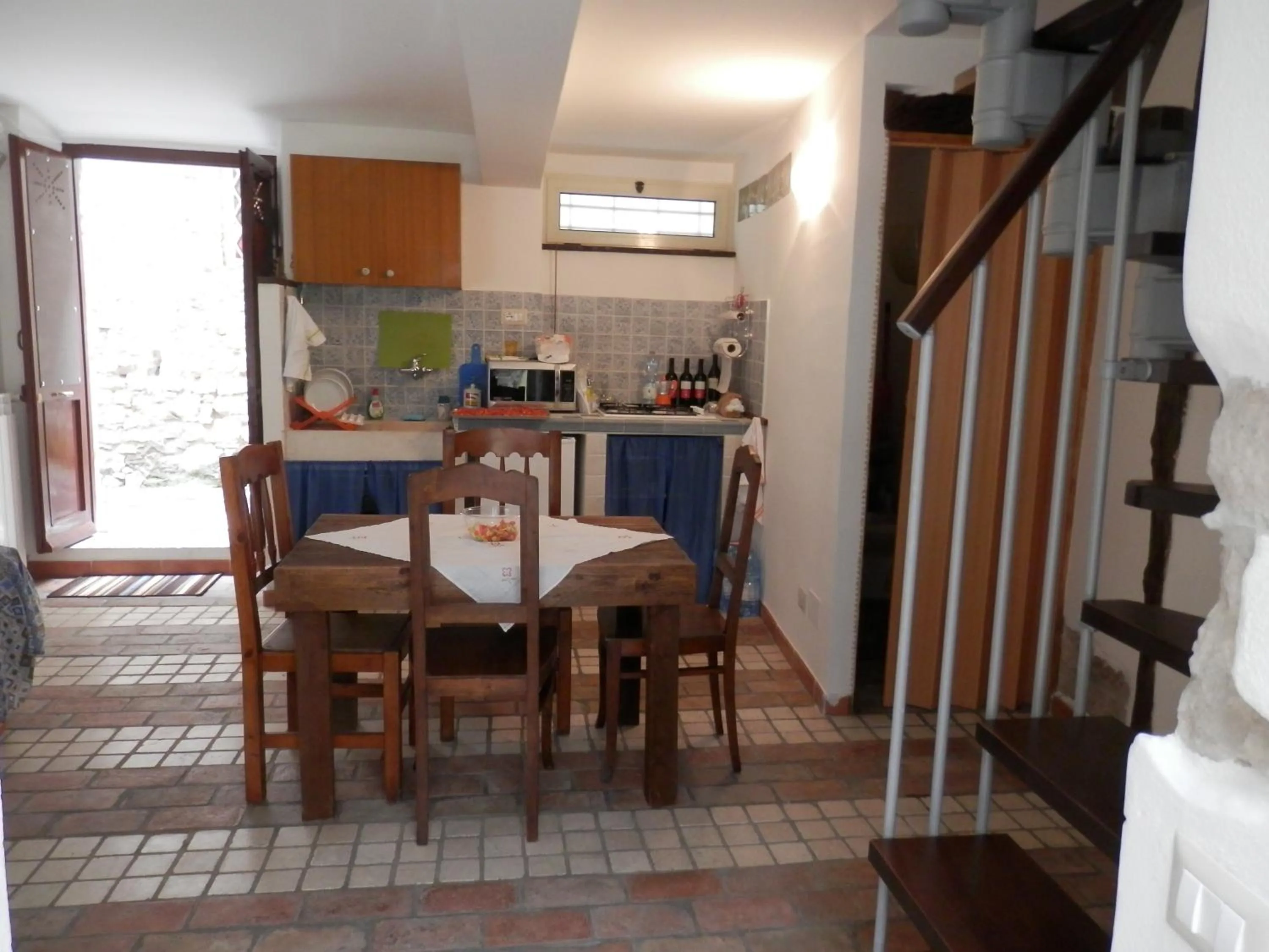Communal kitchen in Calì B&B