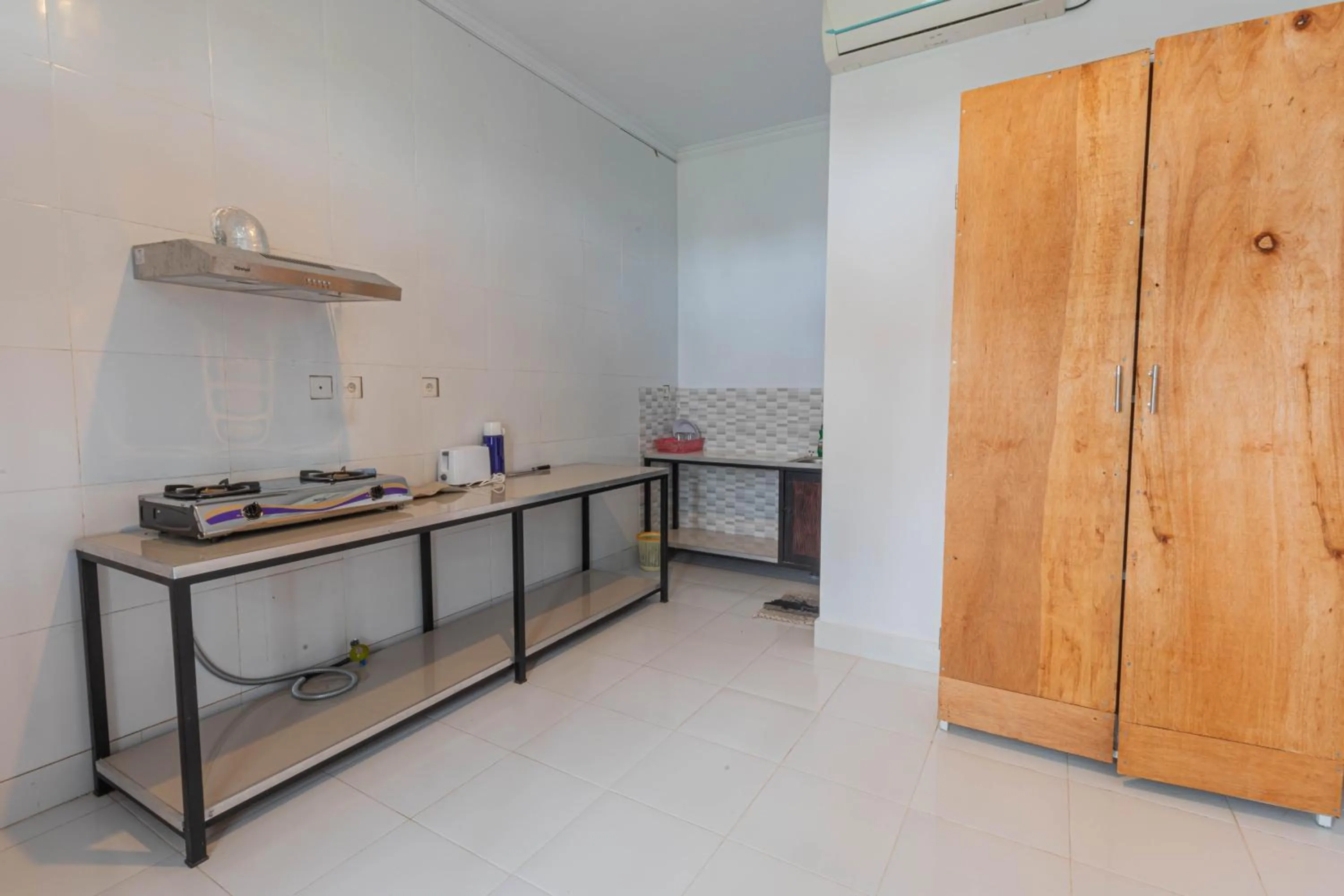 kitchen in Sekar Bali Homestay