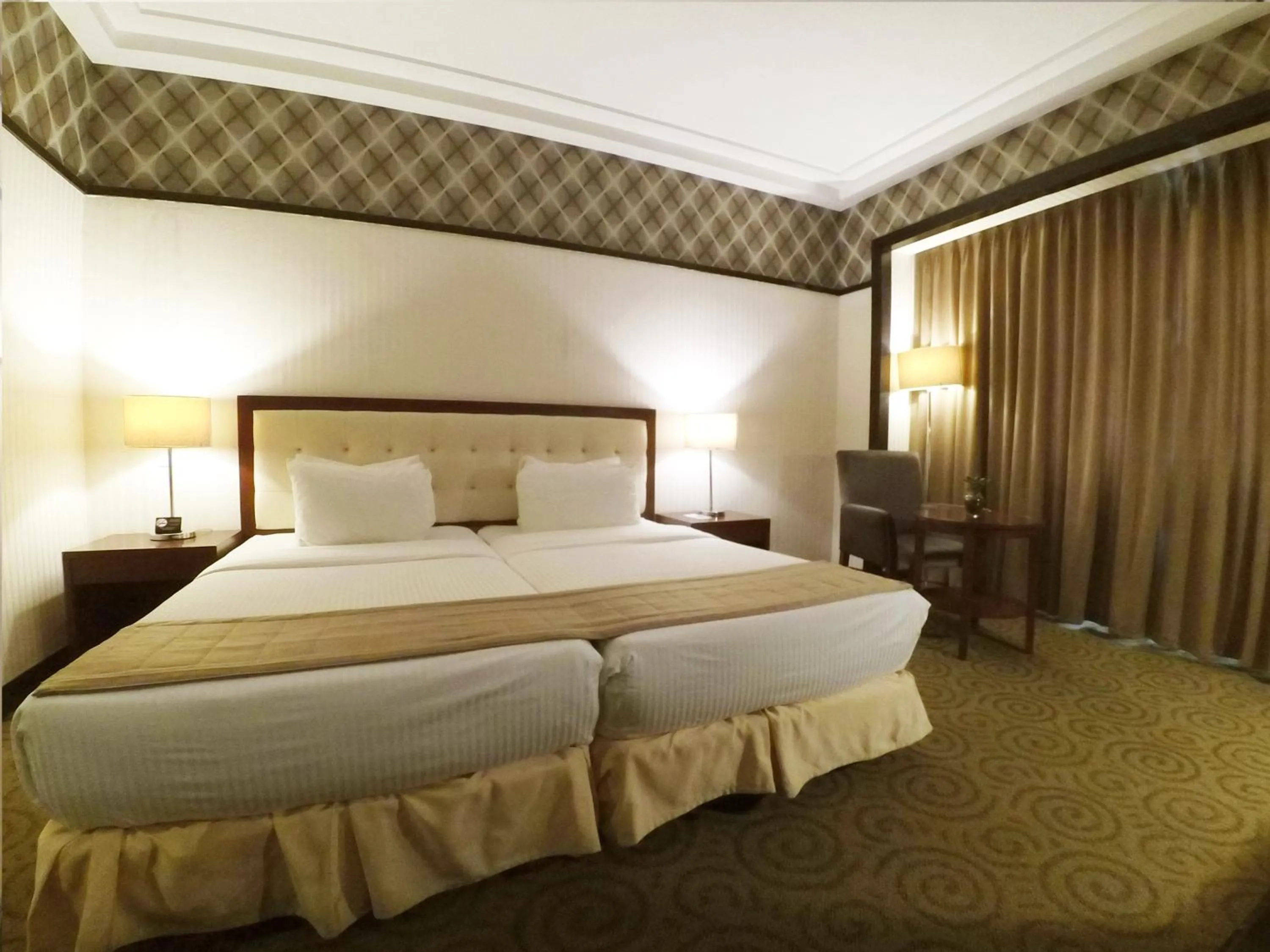 Bed in The Plaza Hotel Balanga City