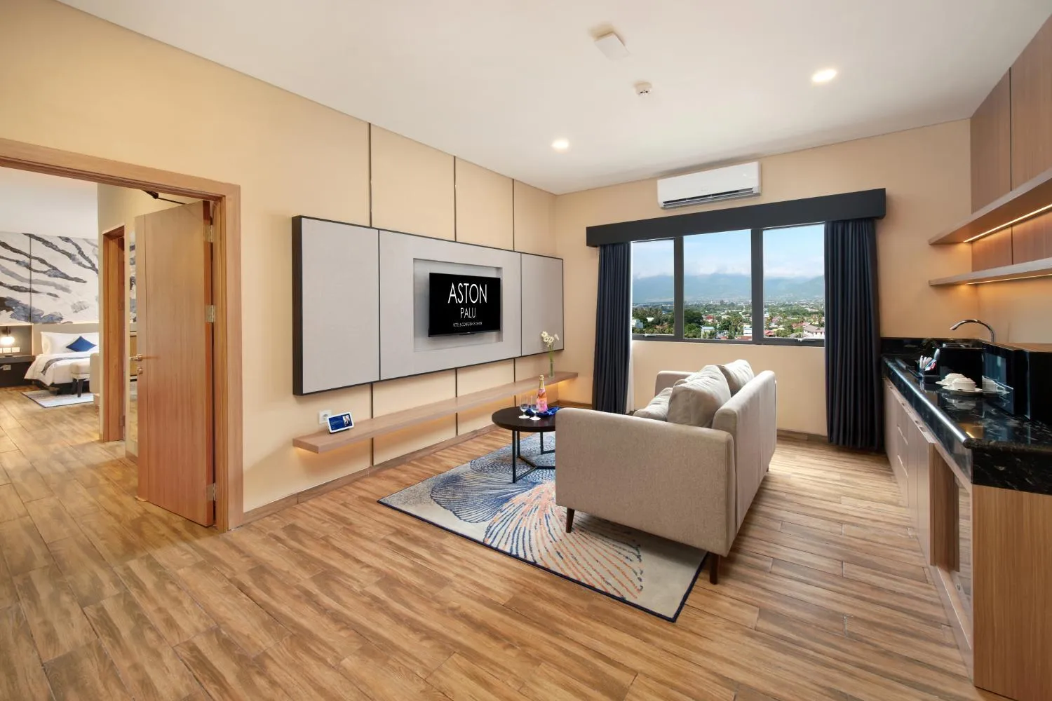 Living room in Aston Palu Hotel & Conference Center