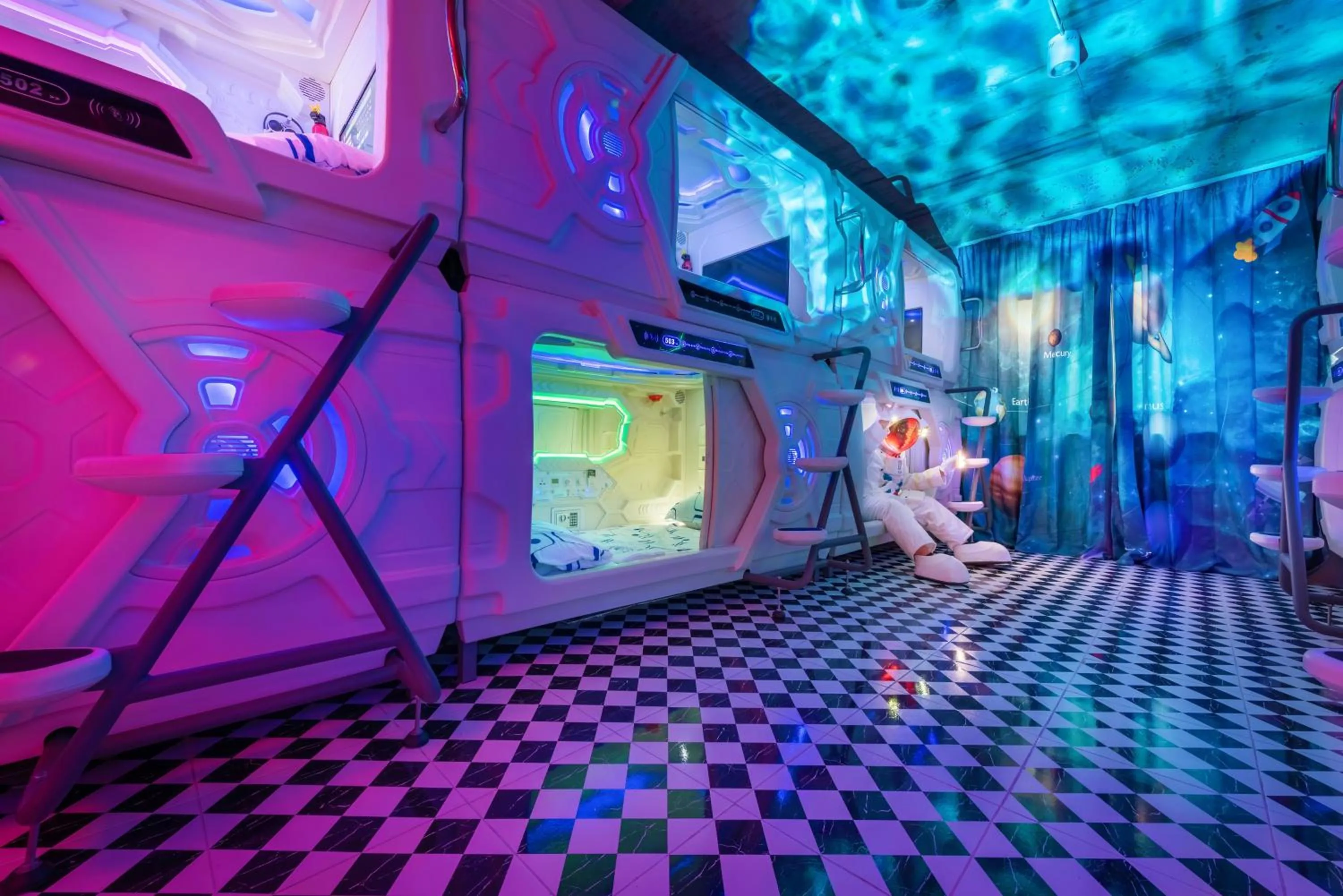 People in Space Station Hostel