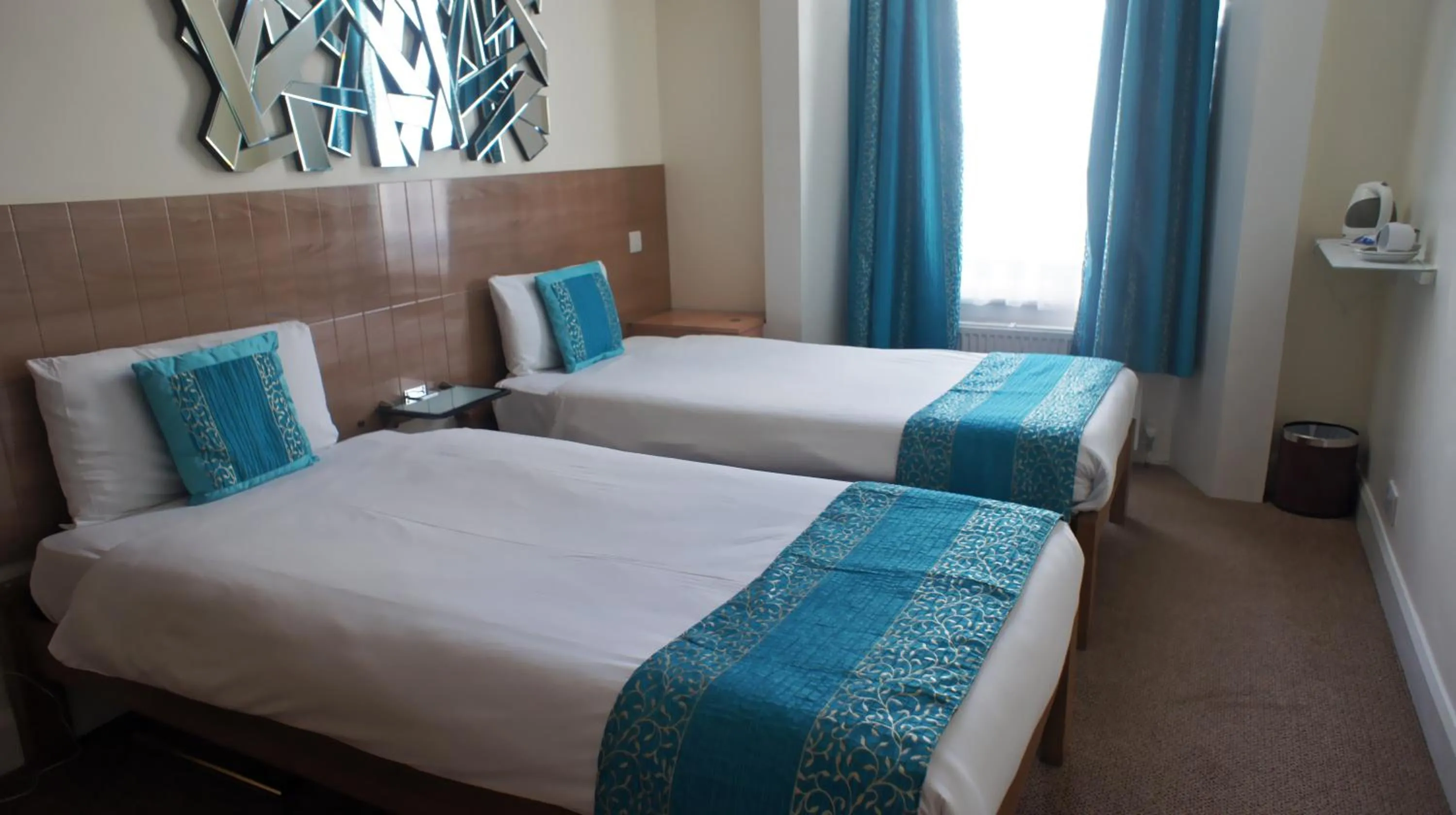 Bed in Westpoint Hotel