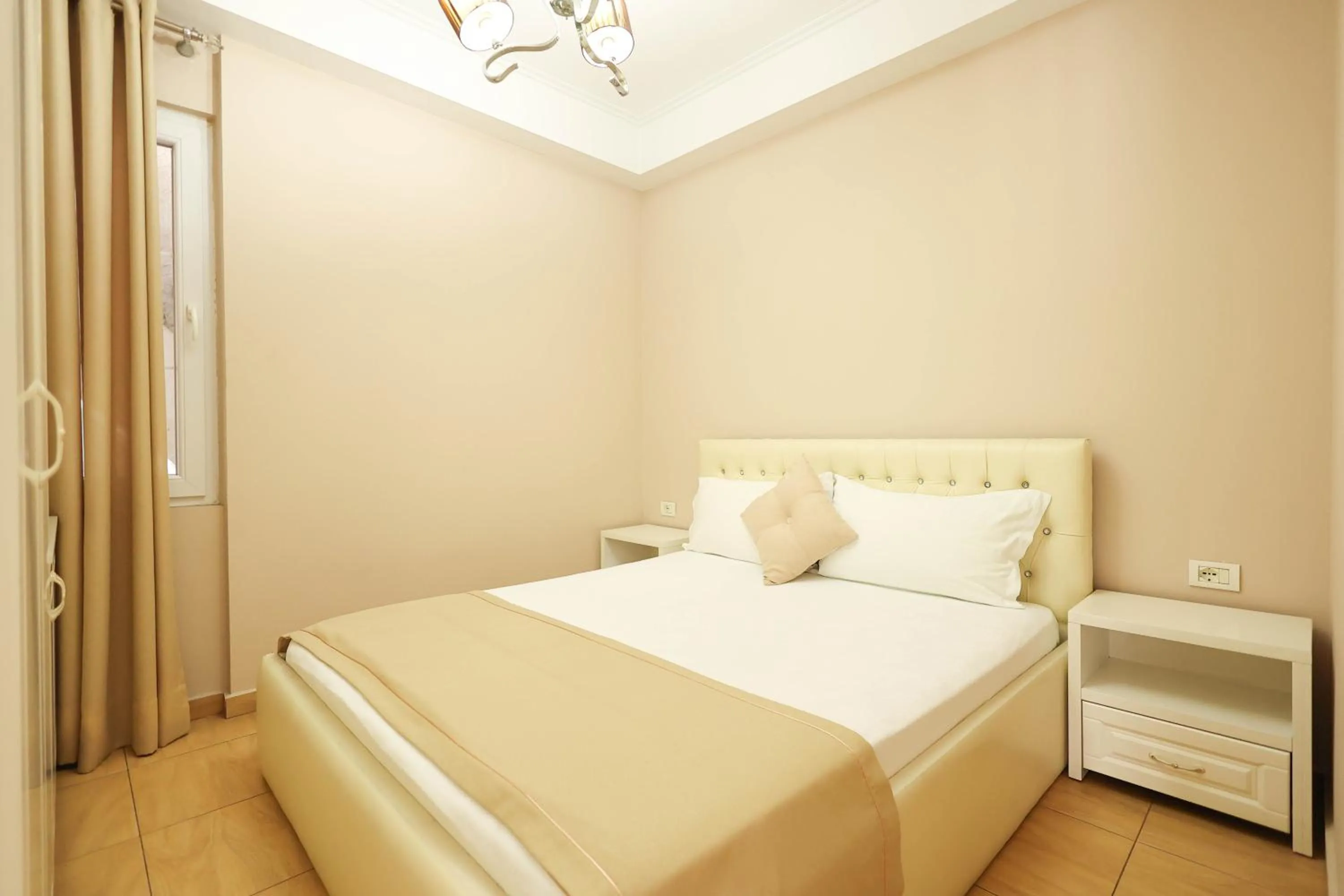 Bed in Apartments Flower Residence