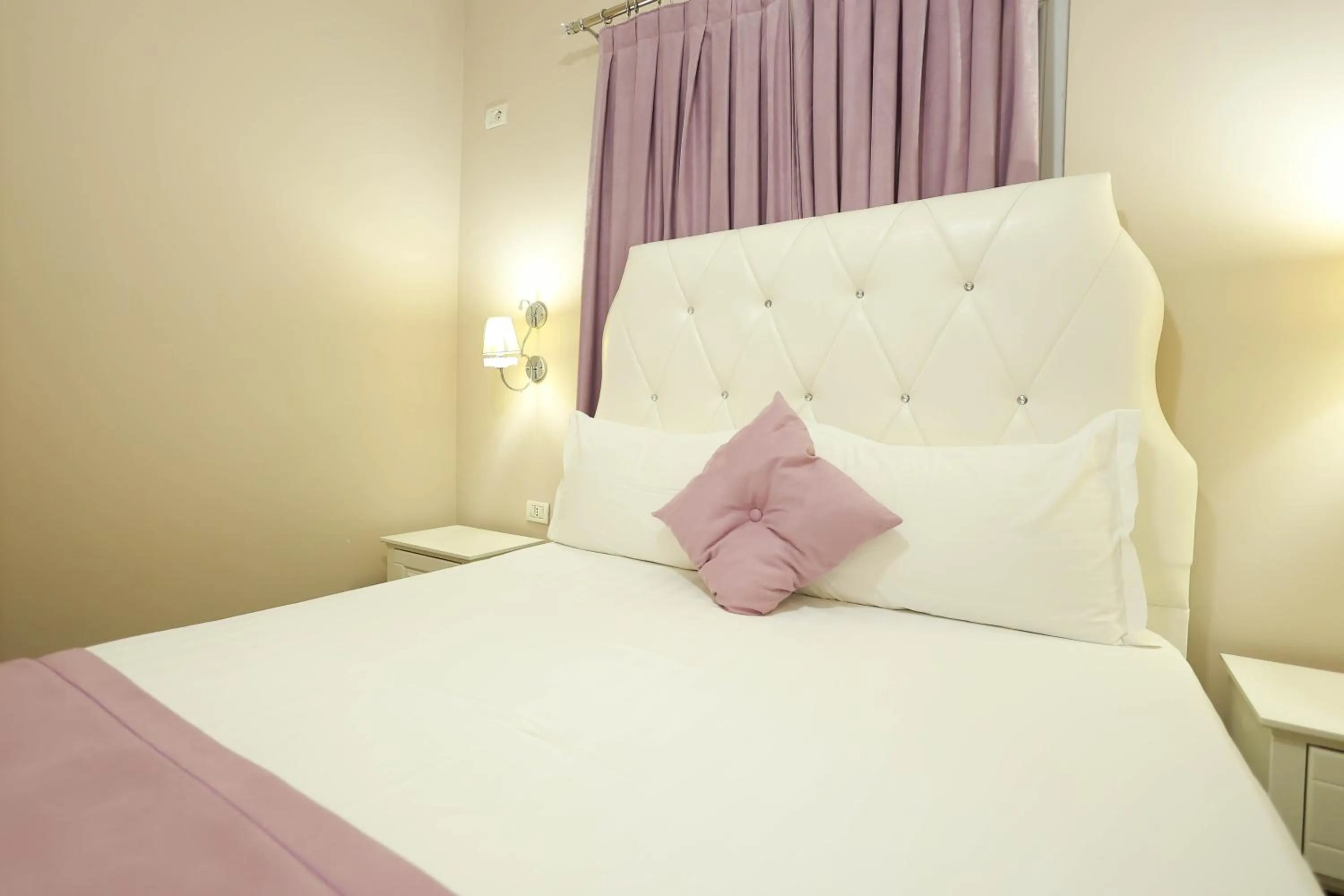 Bed in Apartments Flower Residence