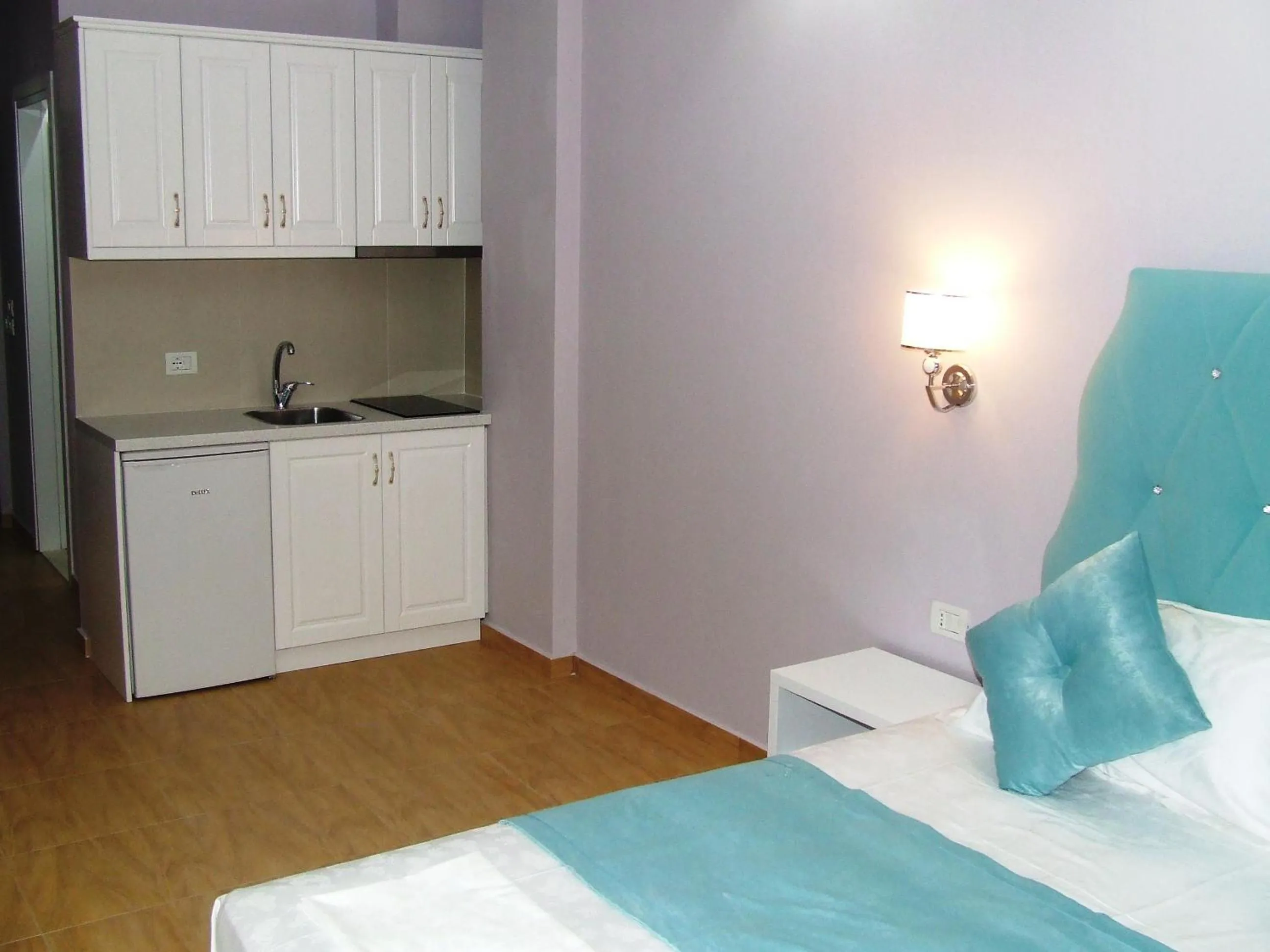 Kitchen or kitchenette in Apartments Flower Residence