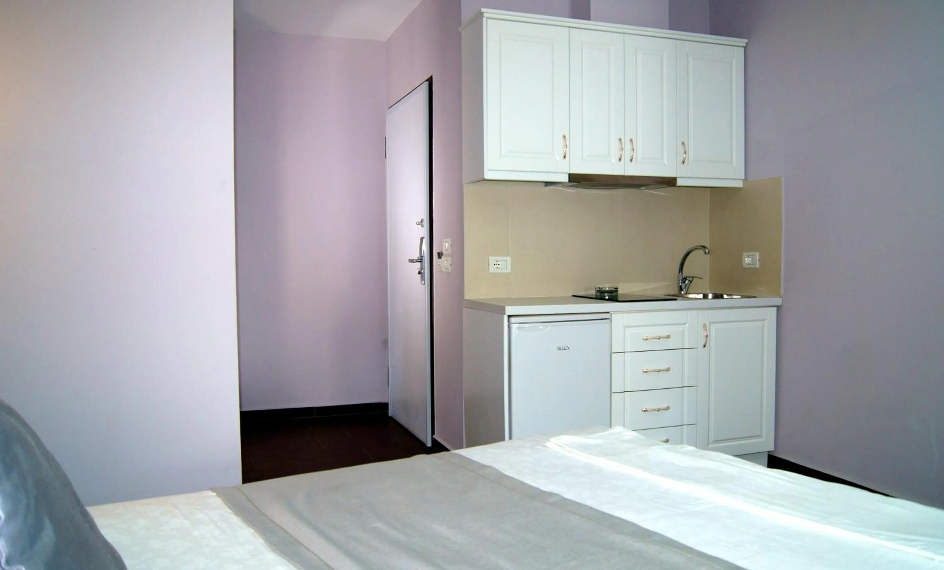 Kitchen or kitchenette in Apartments Flower Residence