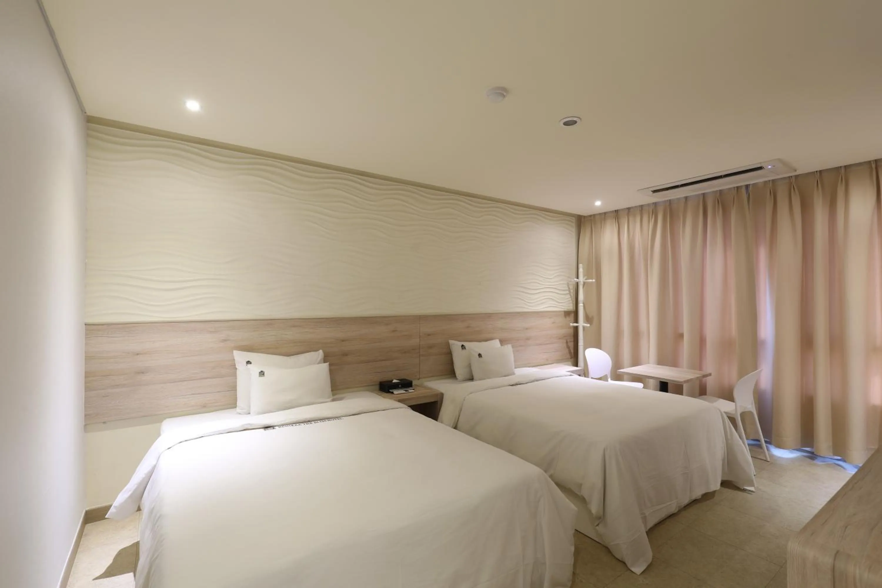 Bed in Hotel The Sea Star